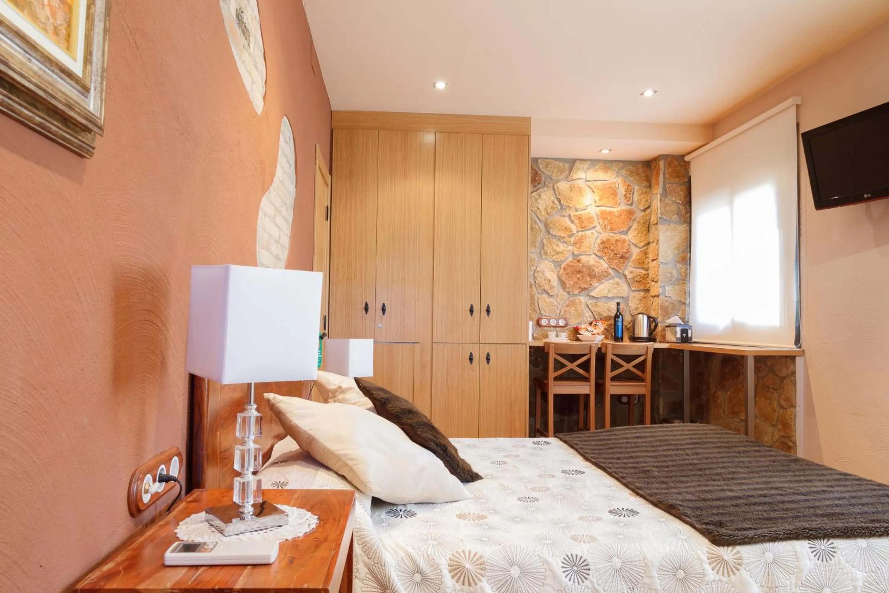 Bed in El Molí de Pontons suites con jacuzzi spa