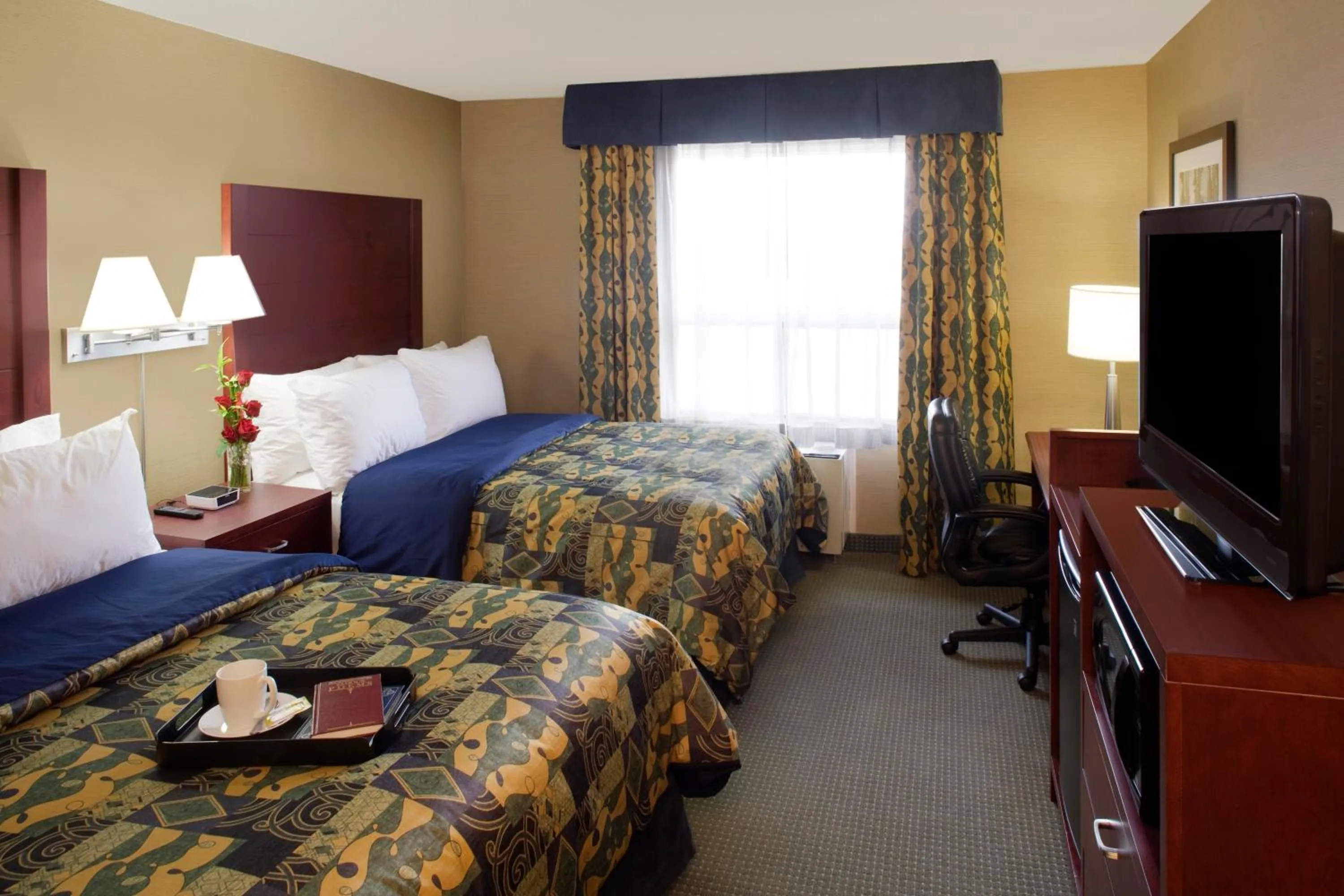 Photo of the whole room in Travelodge by Wyndham Oshawa Whitby