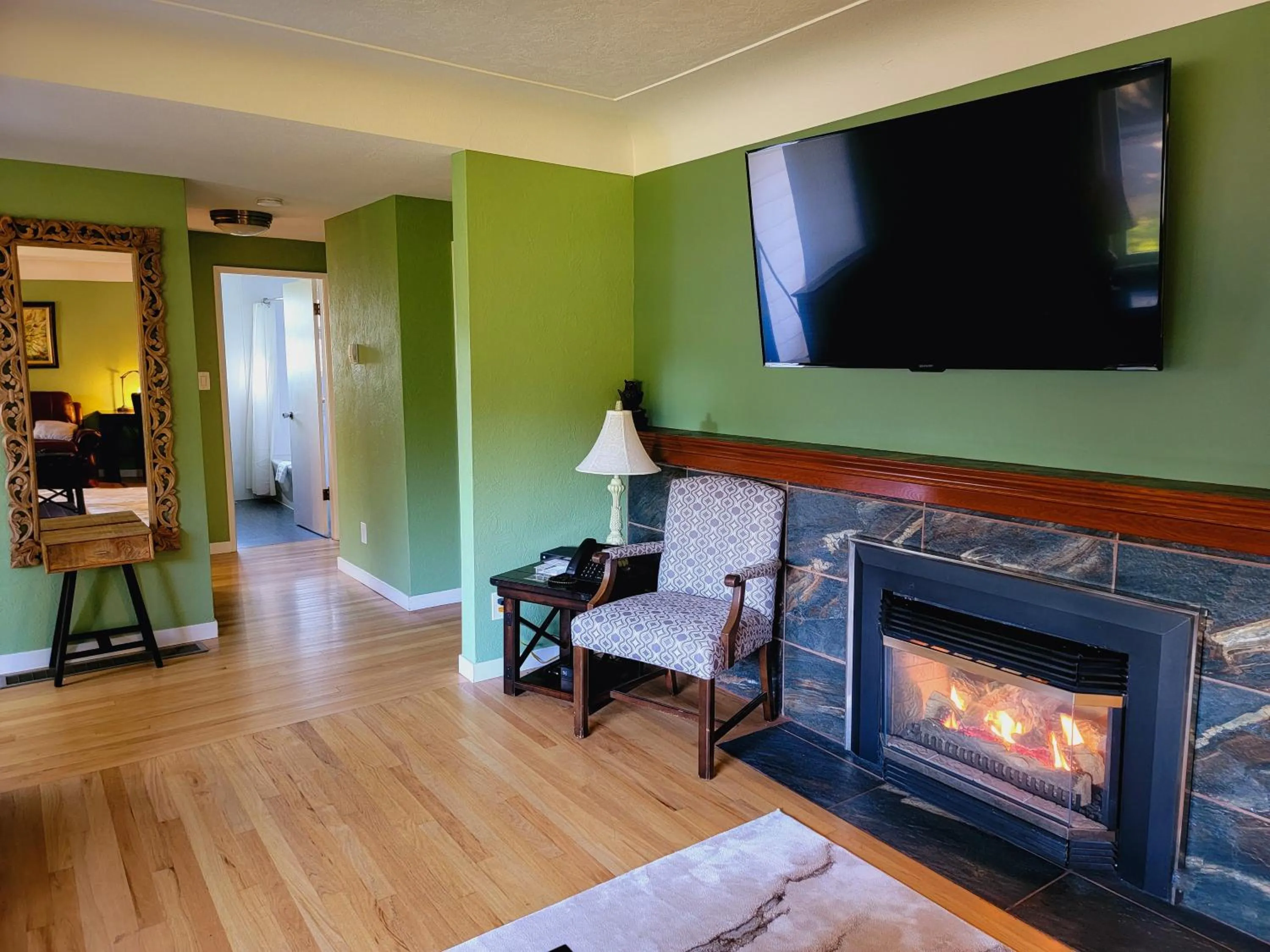 fireplace in James Bay Inn Hotel, Suites & Cottage