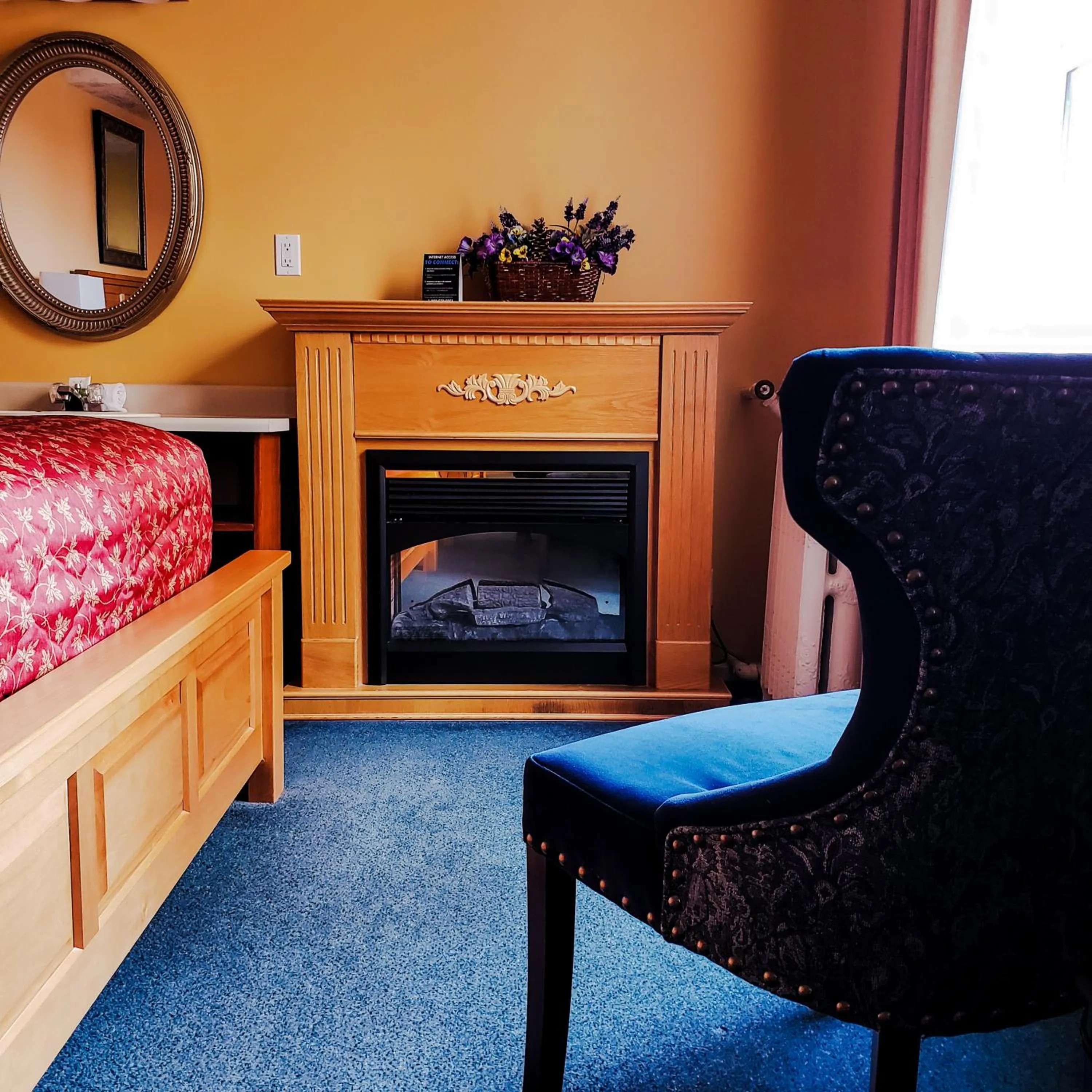 fireplace in James Bay Inn Hotel, Suites & Cottage