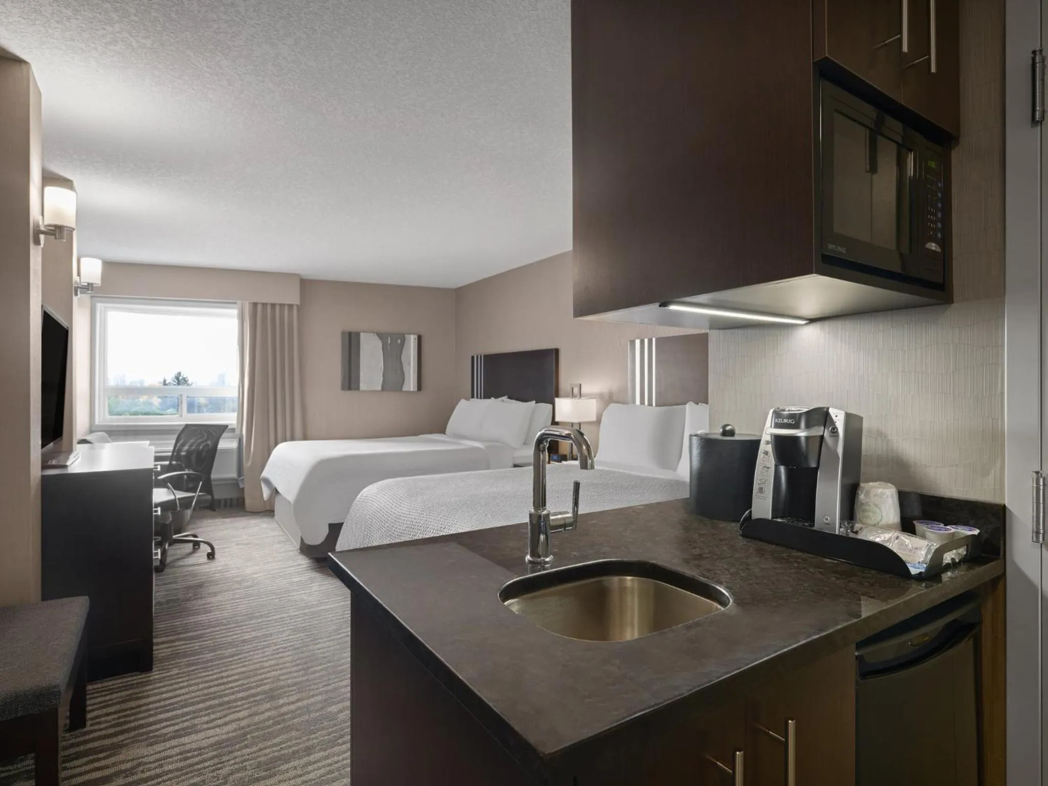Photo of the whole room, Bed in Holiday Inn Calgary Airport by IHG