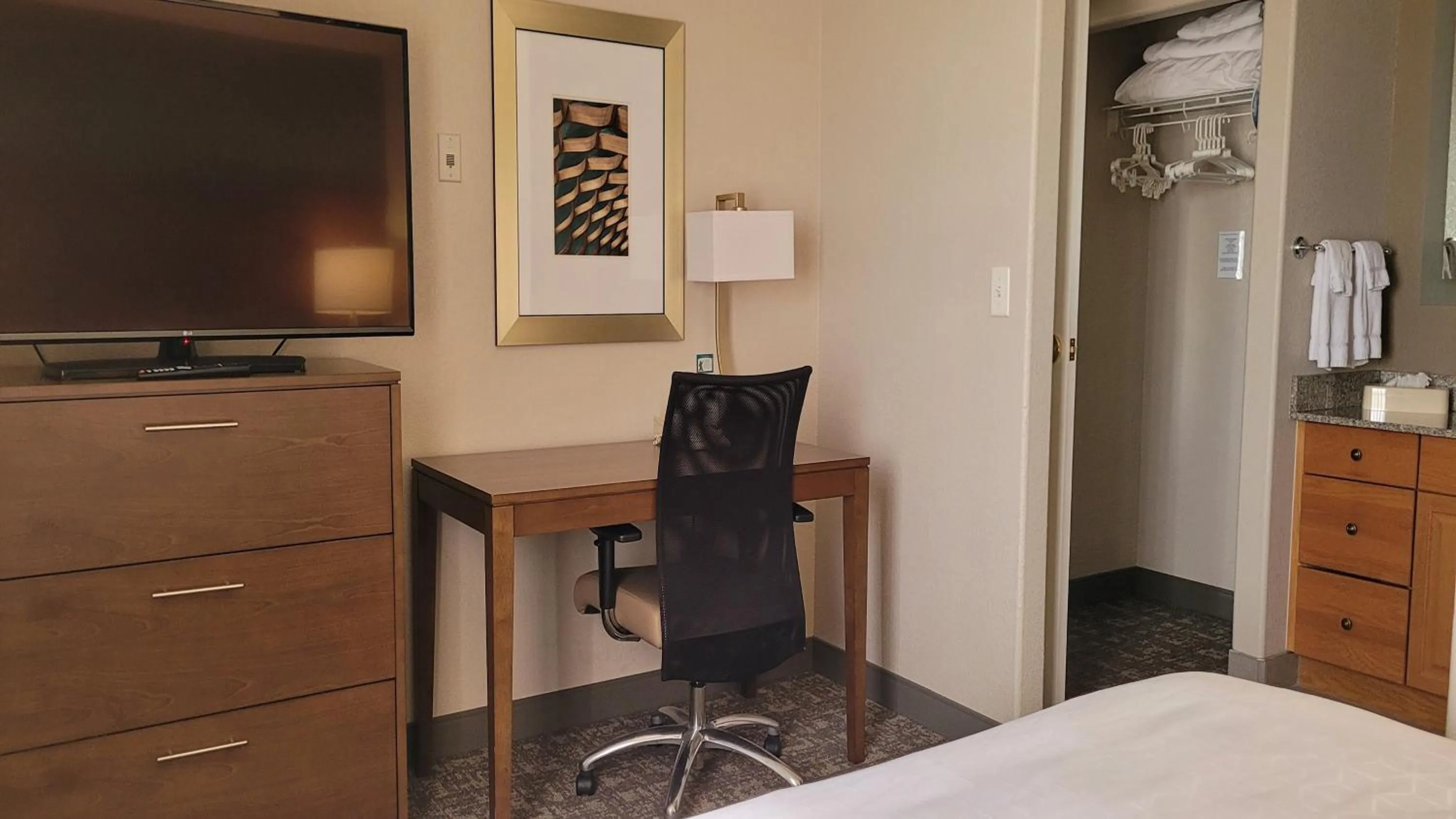 Photo of the whole room, Bed in Staybridge Suites - Calgary Airport by IHG