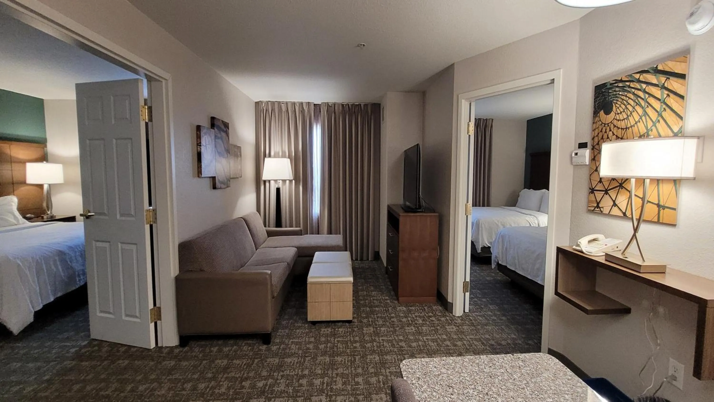 Living room, Bed in Staybridge Suites - Calgary Airport by IHG