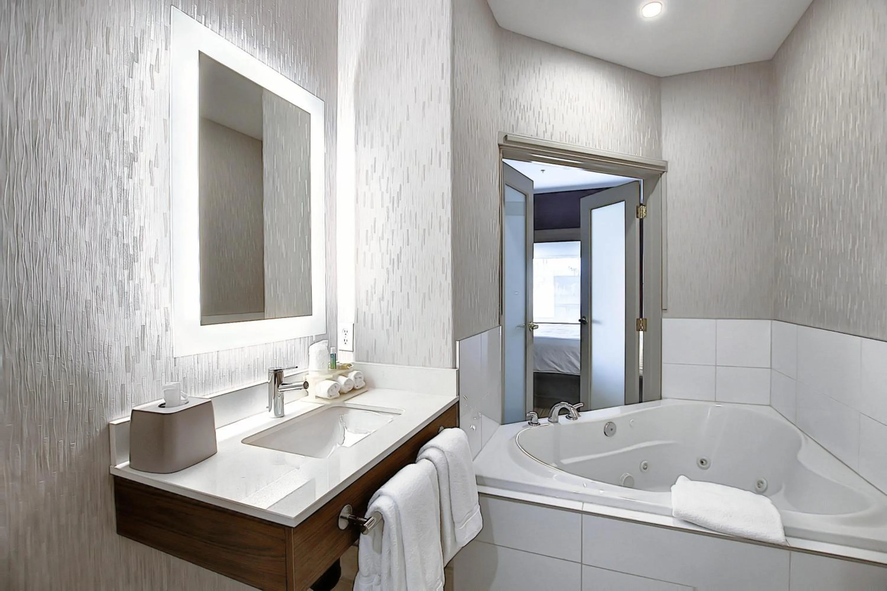 Bathroom in Holiday Inn Express Airport Calgary by IHG