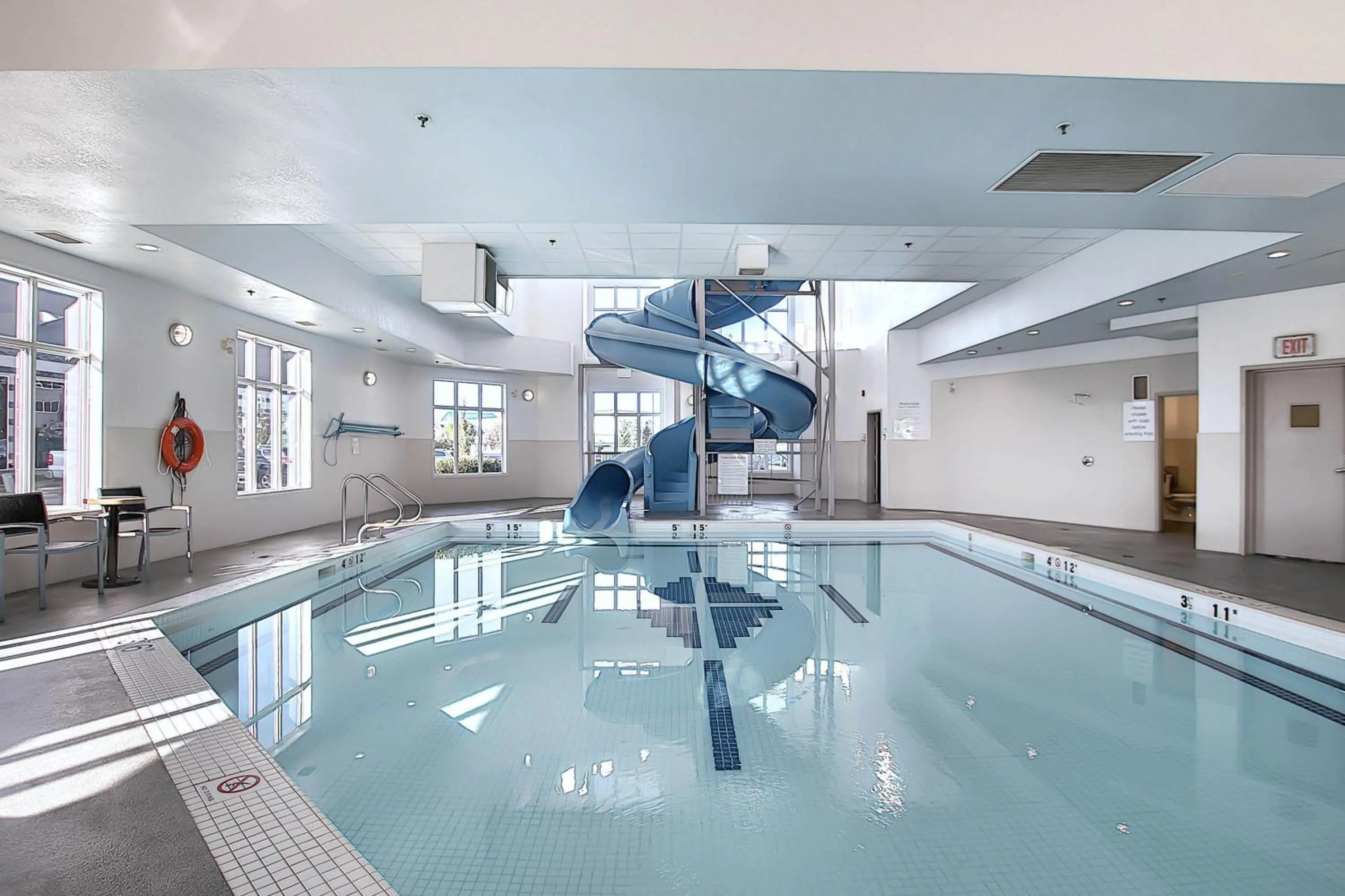 Swimming pool in Holiday Inn Express Airport Calgary by IHG