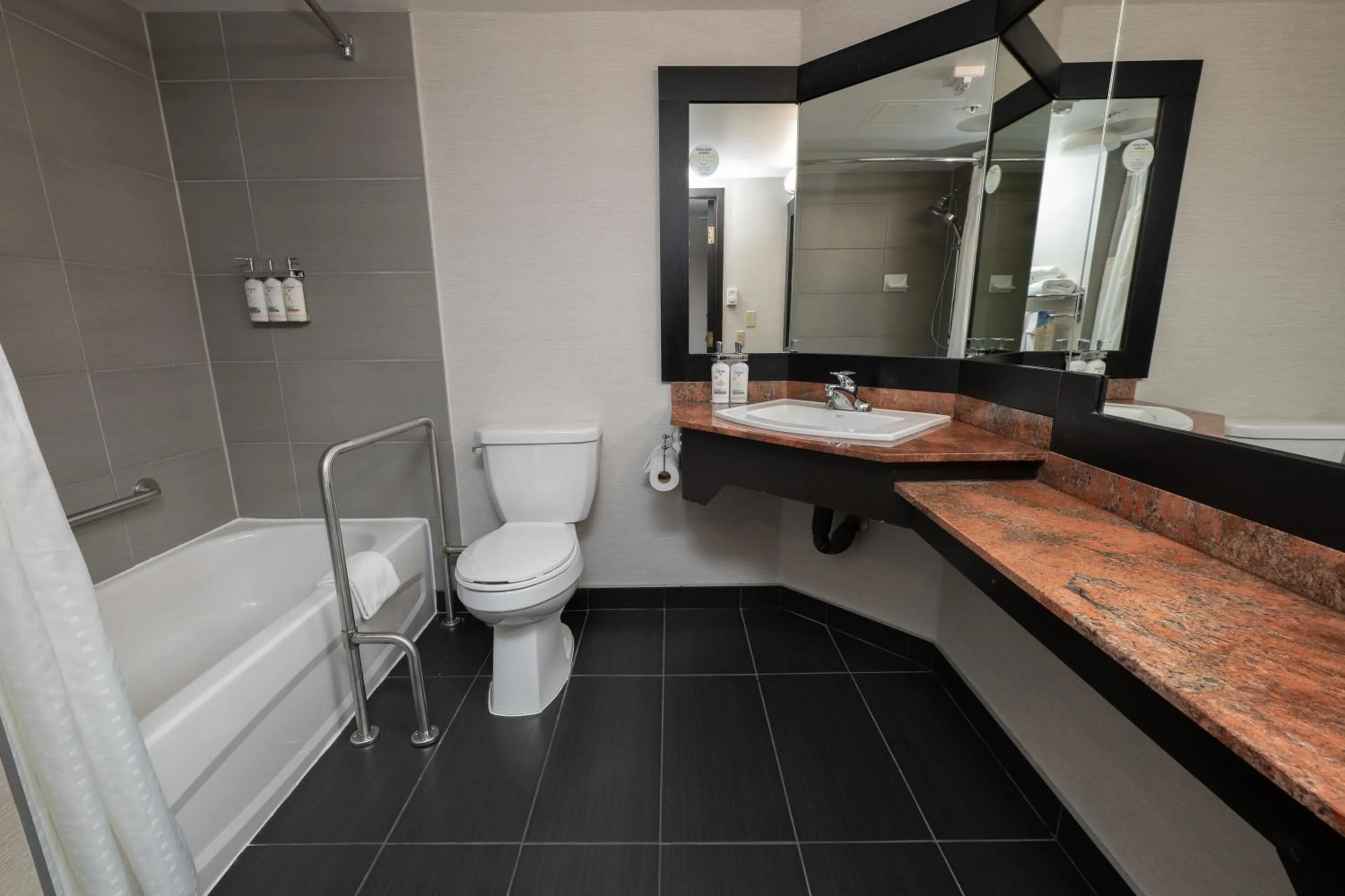 Toilet in Holiday Inn Montreal Centre Ville Downtown by IHG