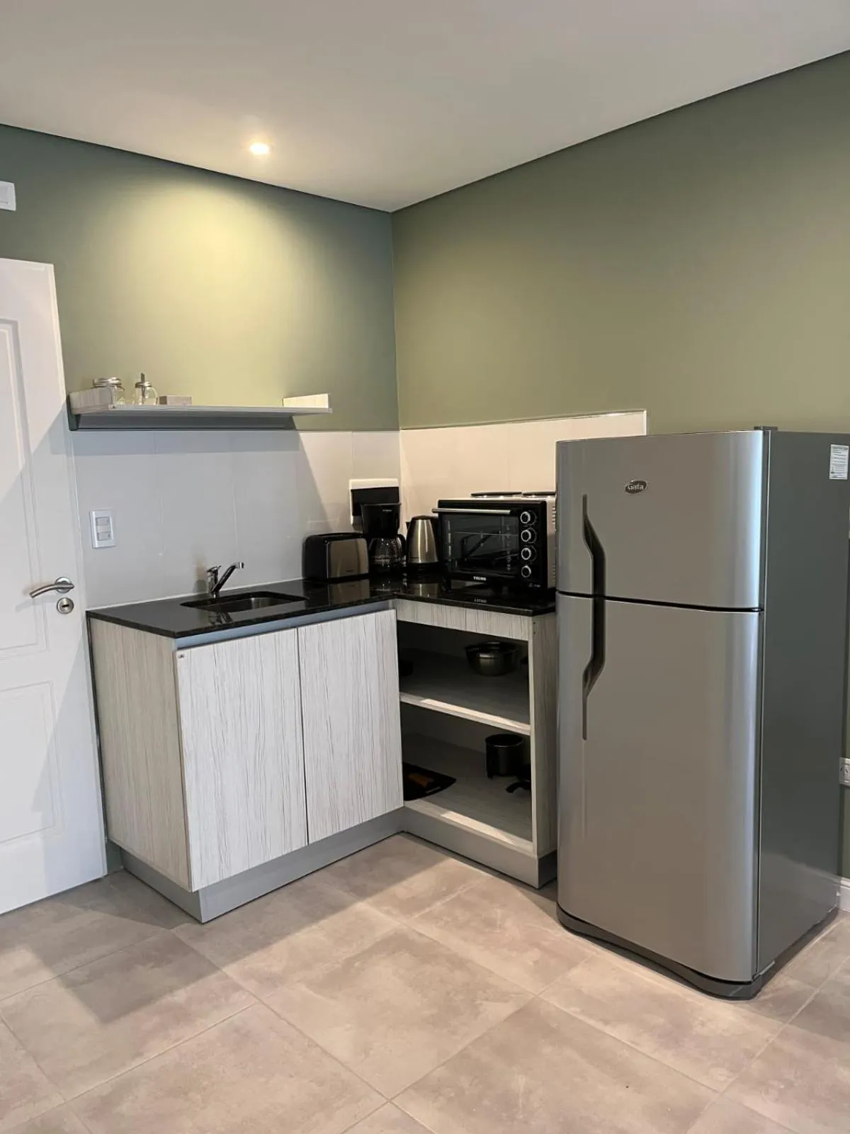 Kitchen or kitchenette in Los Robles Apart Hotel