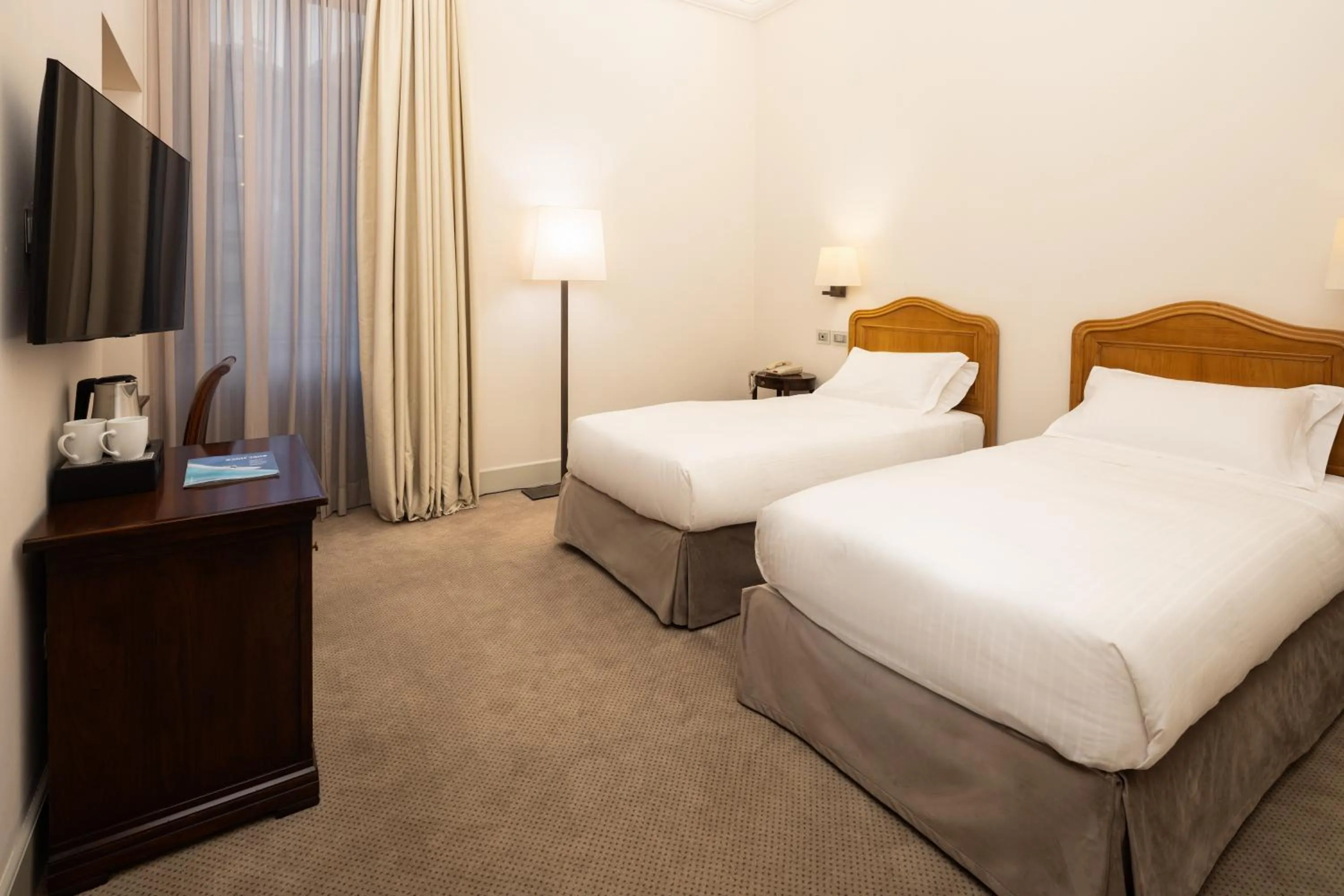 Bed in Grand Hotel della Posta, WorldHotels Distinctive