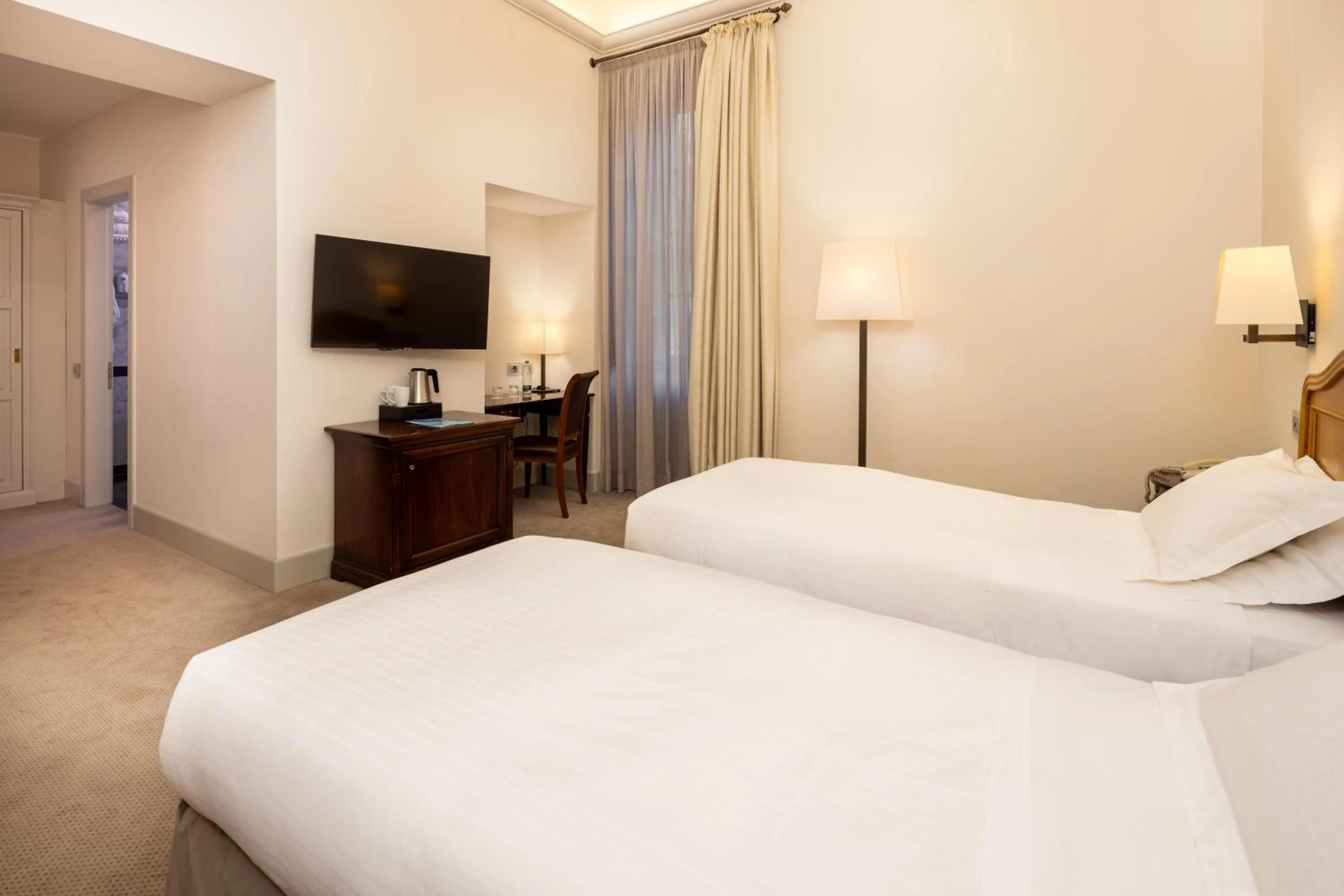 Bed in Grand Hotel della Posta, WorldHotels Distinctive