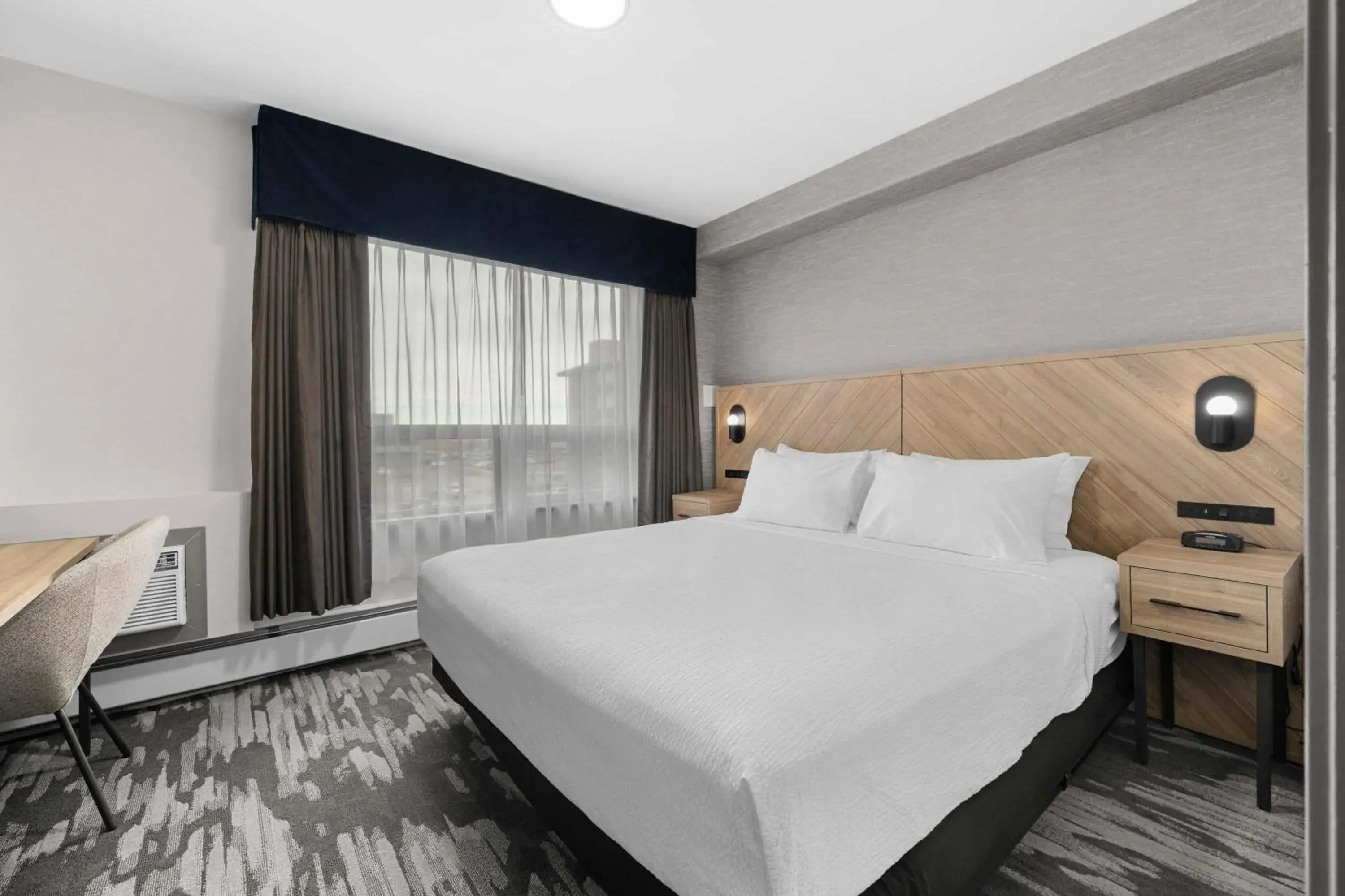 Standard Suite, 1 King Bed, Sofa Bed, Kitchenette in Sandman Hotel Calgary Airport Standard Suite, 1 King Bed, Sofa Bed, Kitchenette in Sandman Hotel Calgary Airport