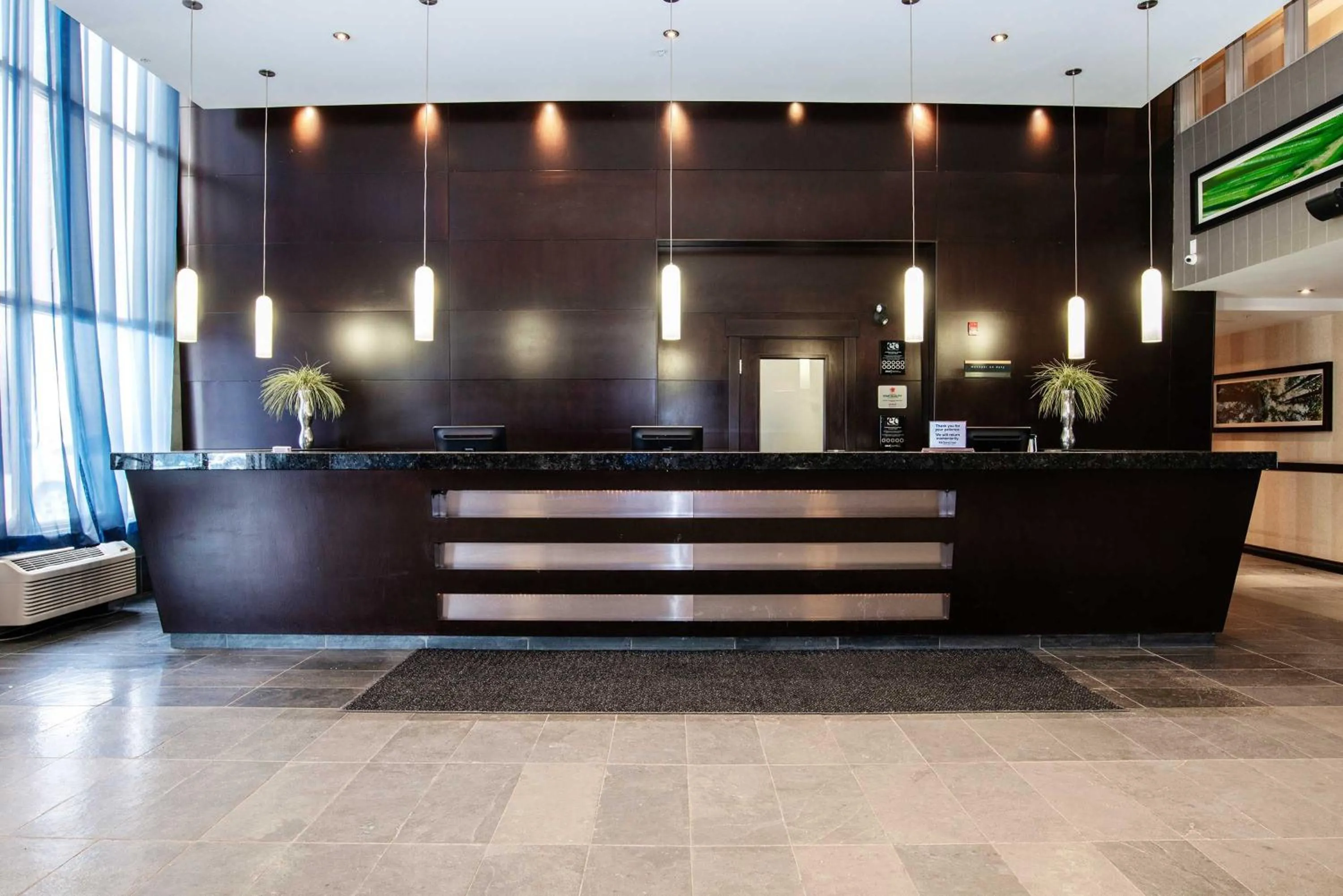 Lobby or reception in Sandman Hotel & Suites Calgary West