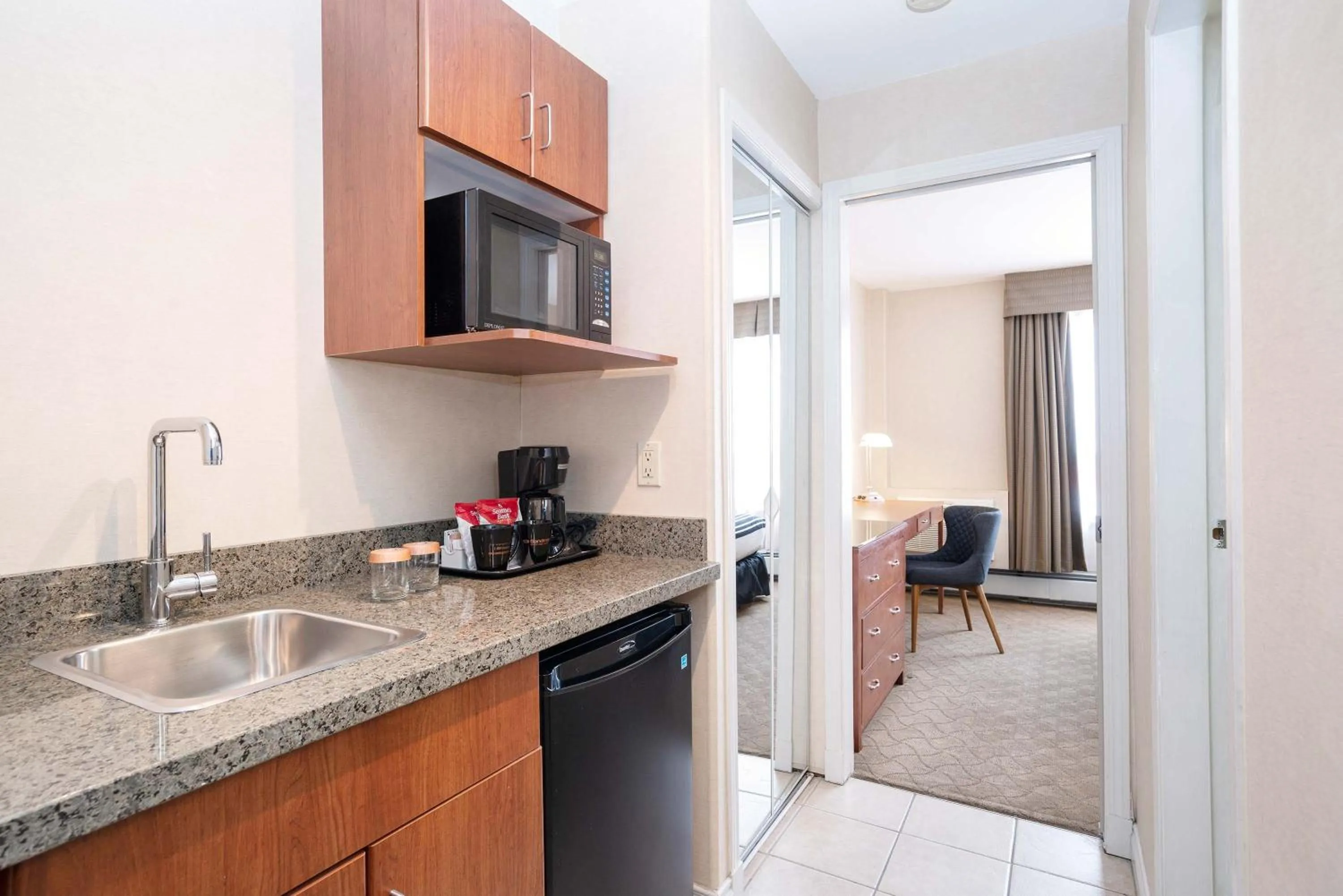 Kitchen or kitchenette in Sandman Hotel & Suites Calgary West