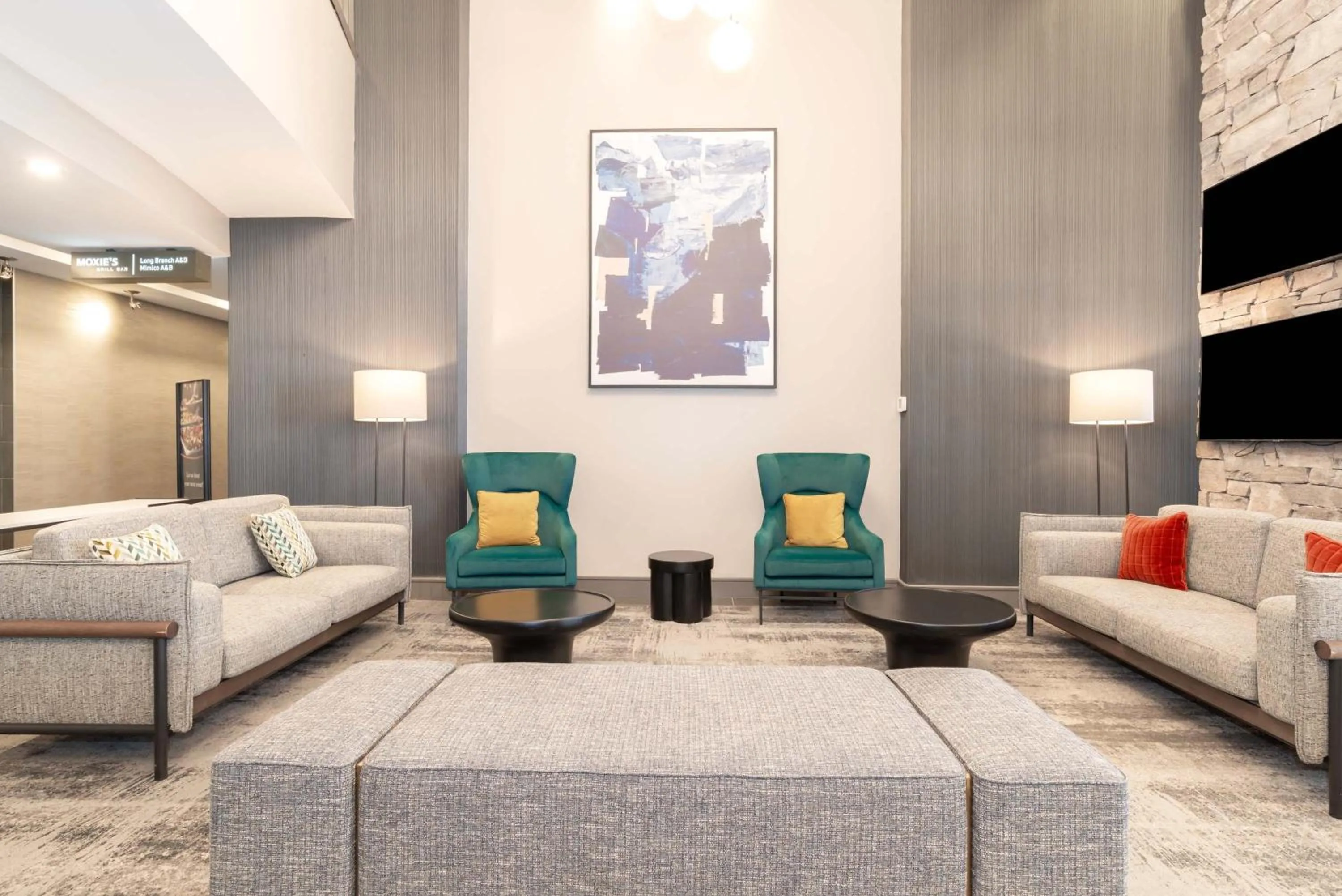 Lobby or reception in Sandman Signature Toronto Airport Hotel