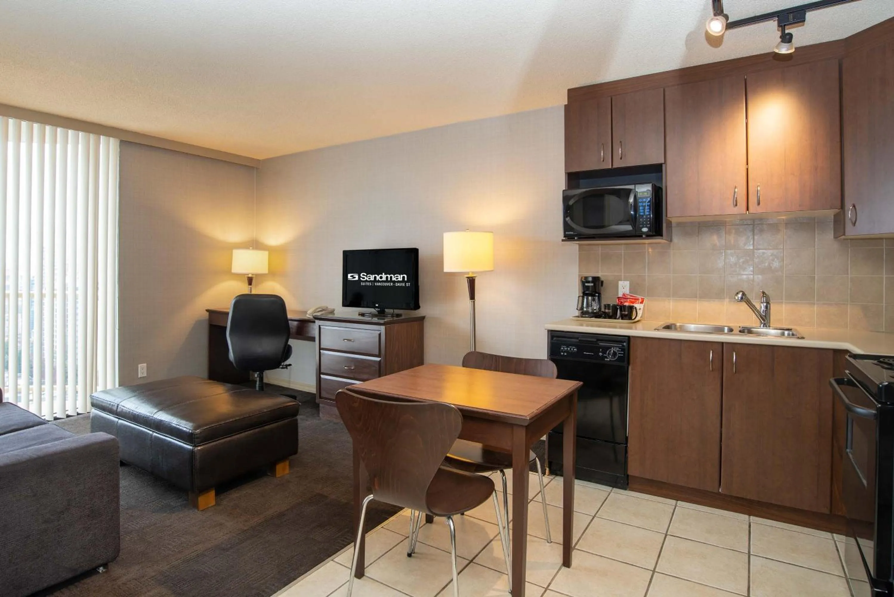 Kitchen or kitchenette in Sandman Suites Vancouver on Davie