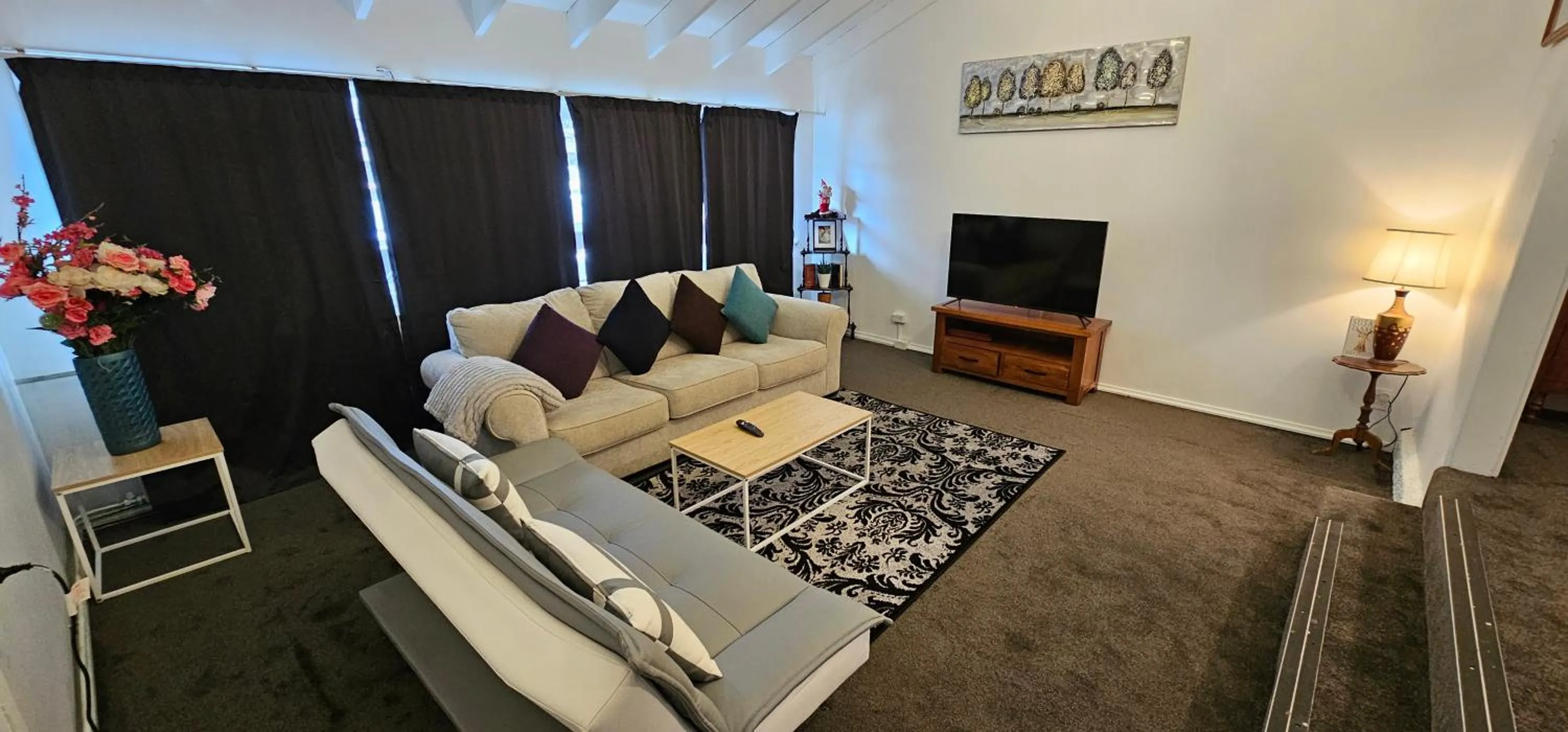 Communal lounge/ TV room in Kiwi As Guest House