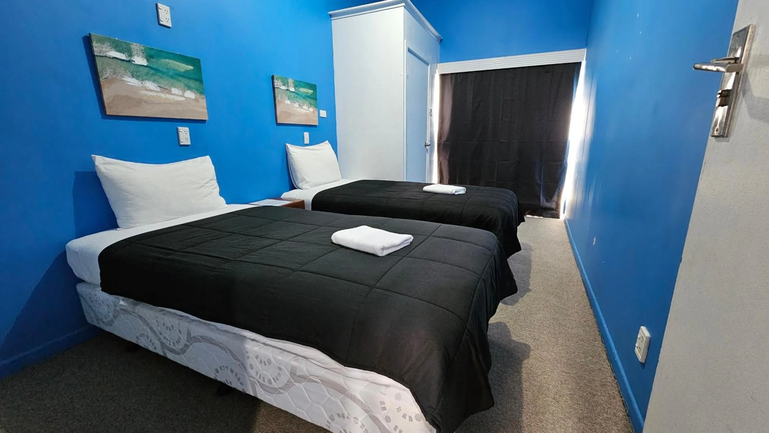 Bed in Kiwi As Guest House