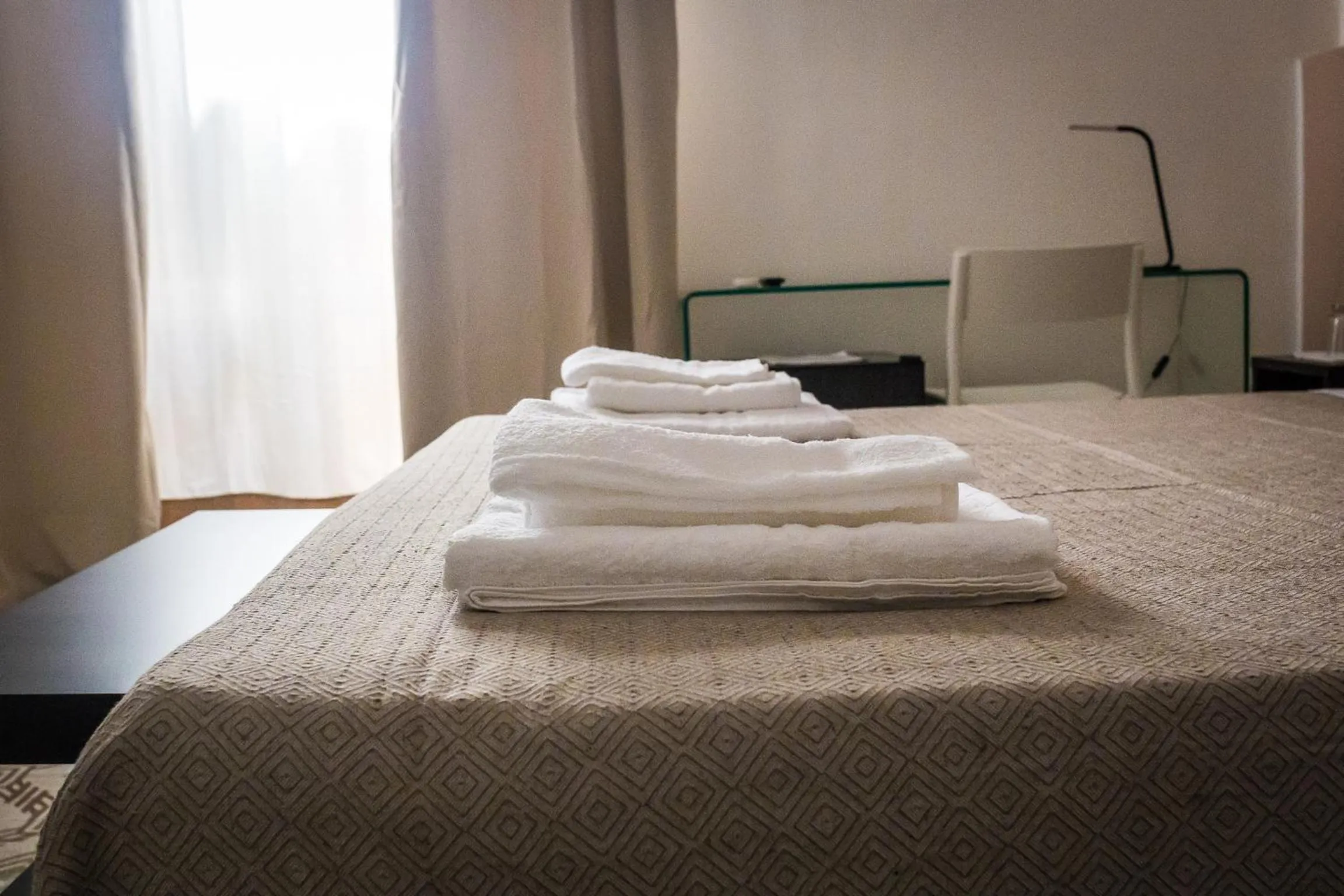 Bed in Liberty Suites