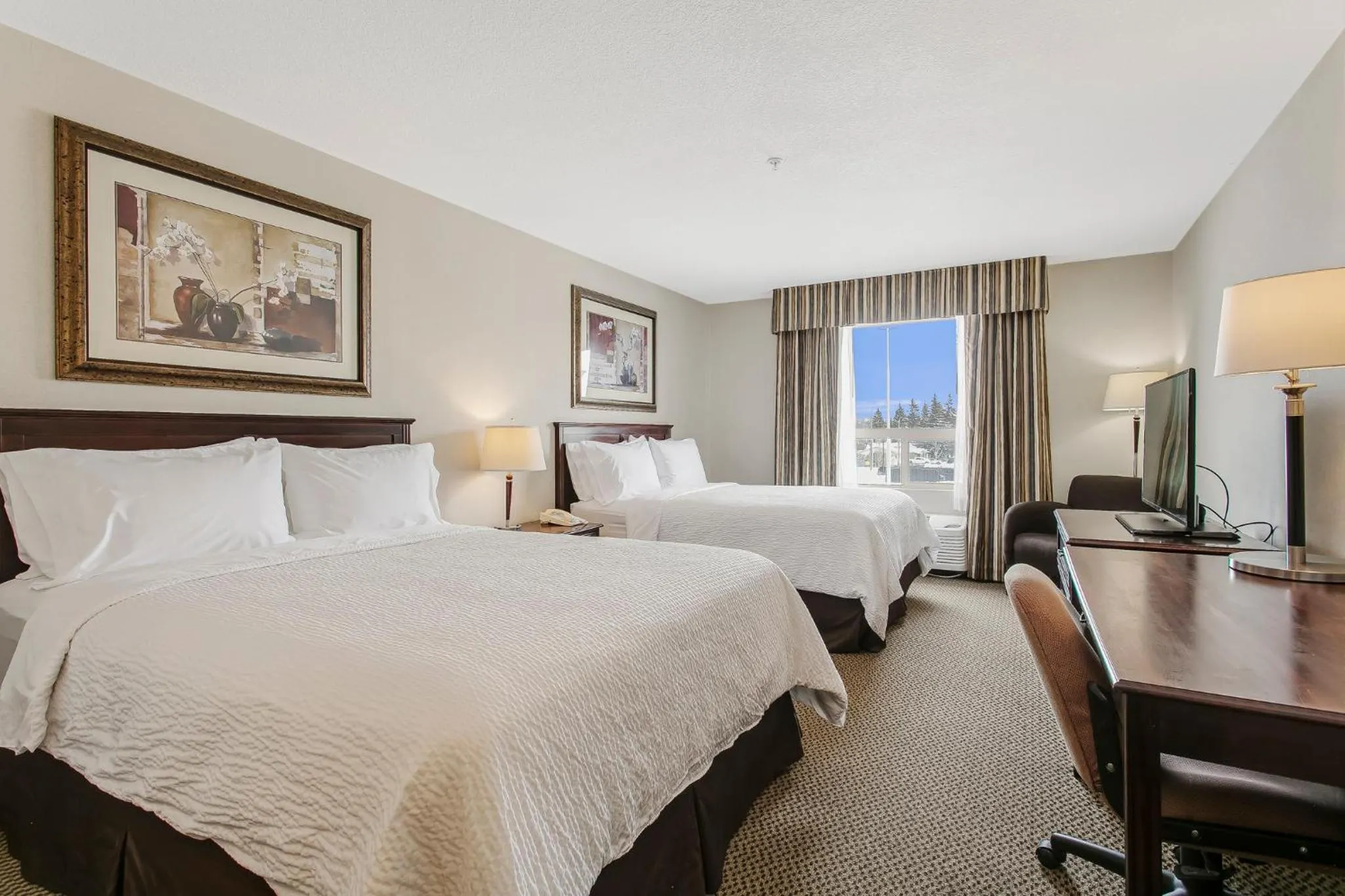 Photo of the whole room, Bed in Holiday Inn & Suites Lloydminster by IHG