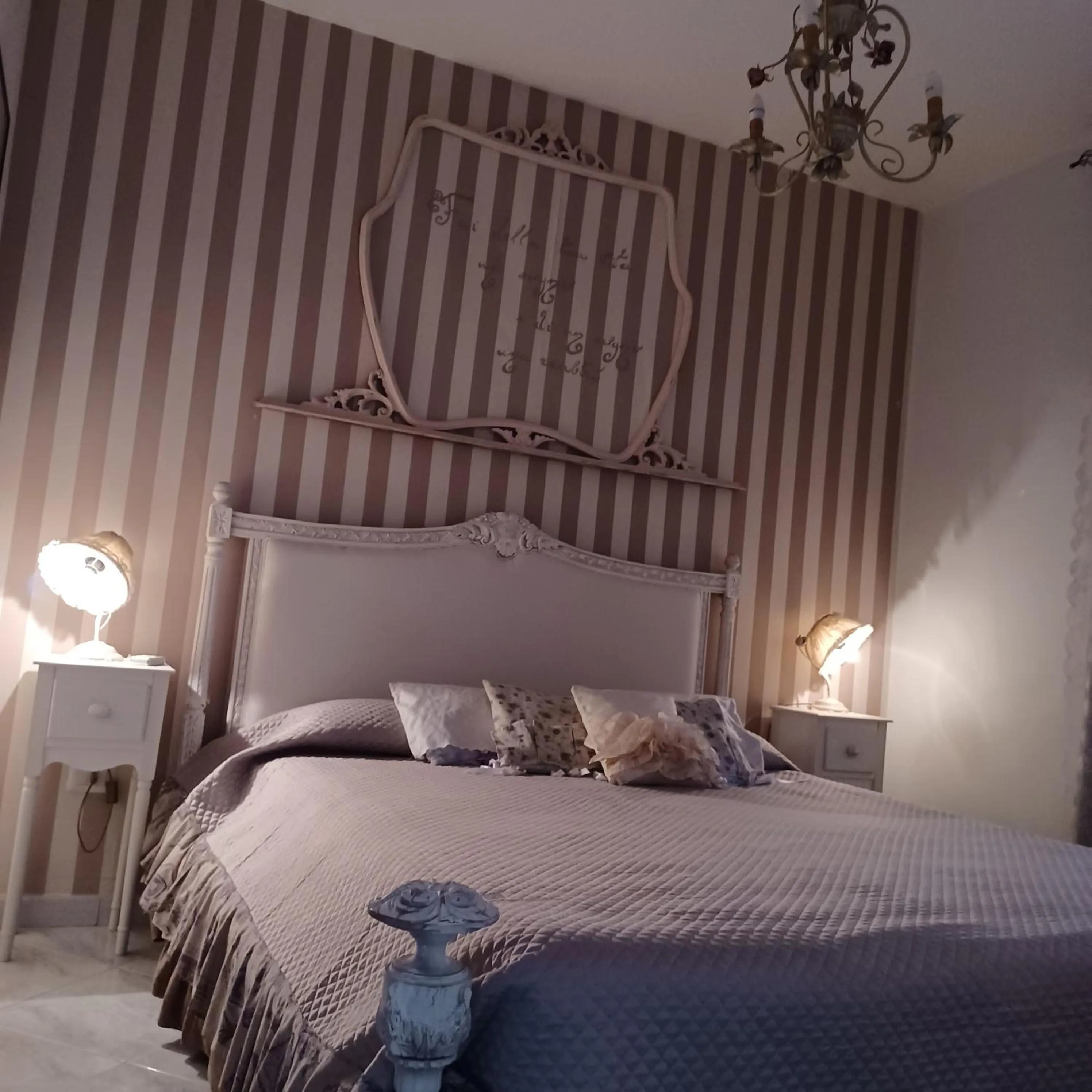 Photo of the whole room, Bed in La Corte delle Vanità