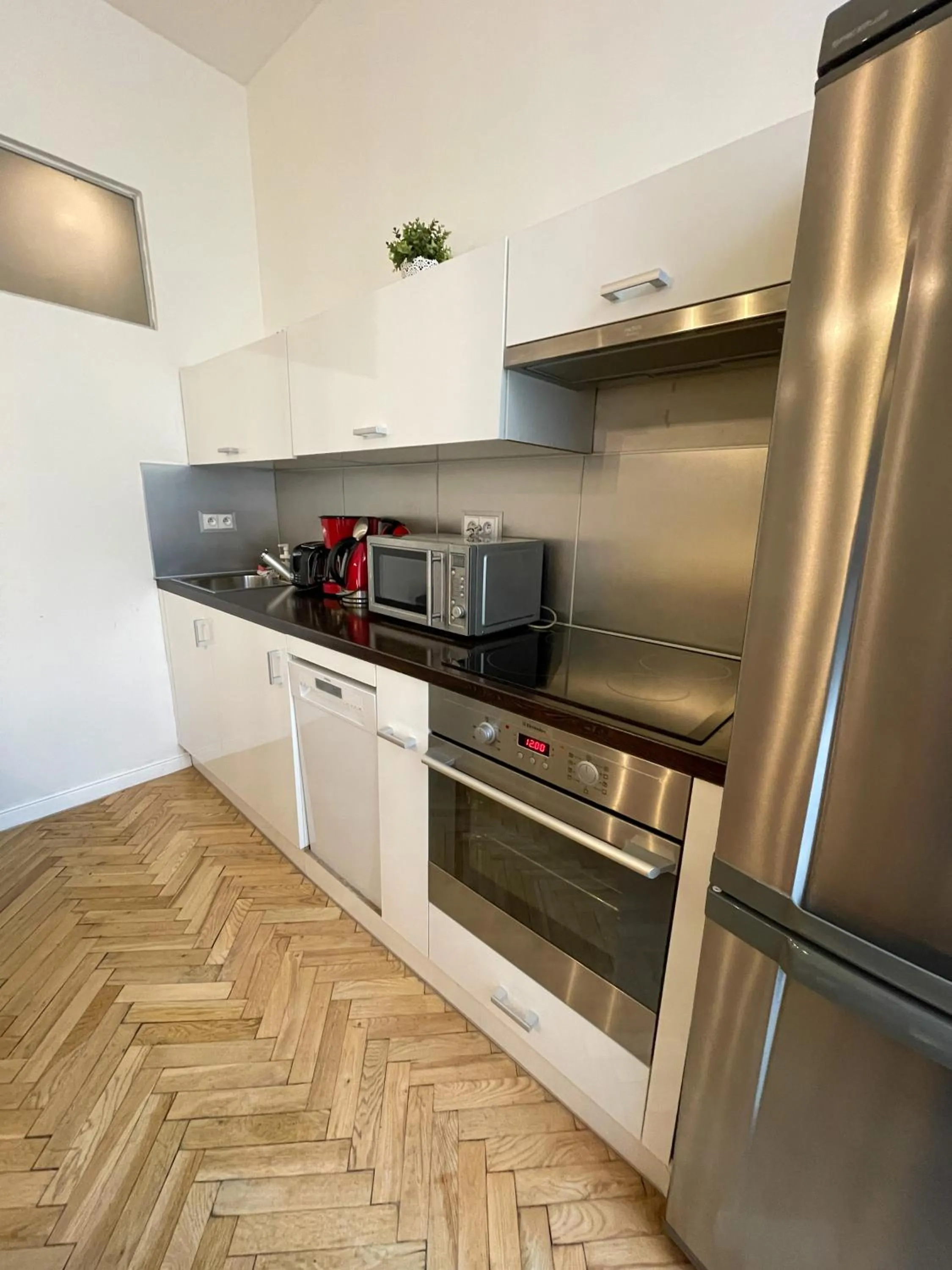 Kitchen or kitchenette in Old Town Square Apartments