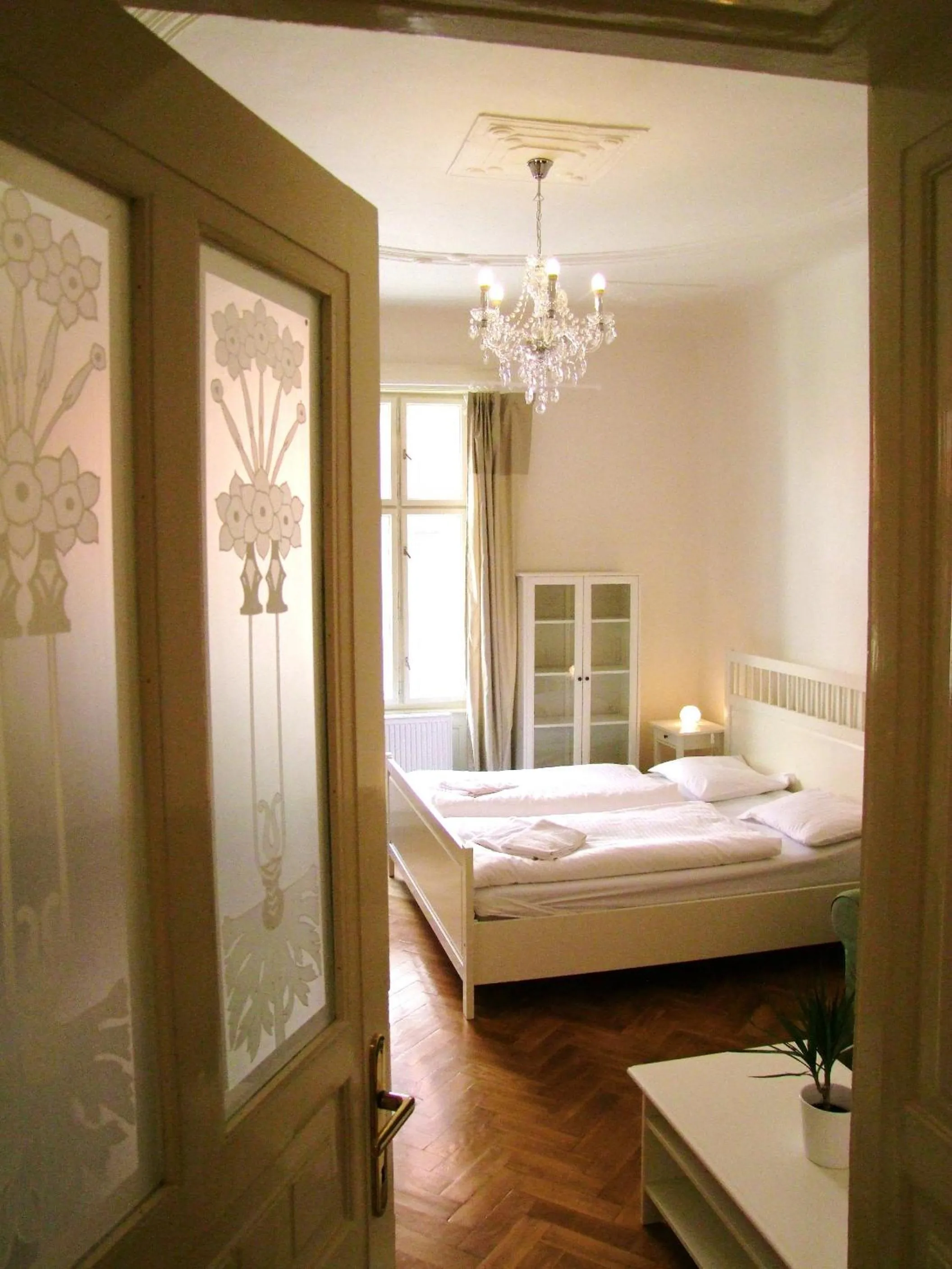 Bed in Old Town Square Apartments