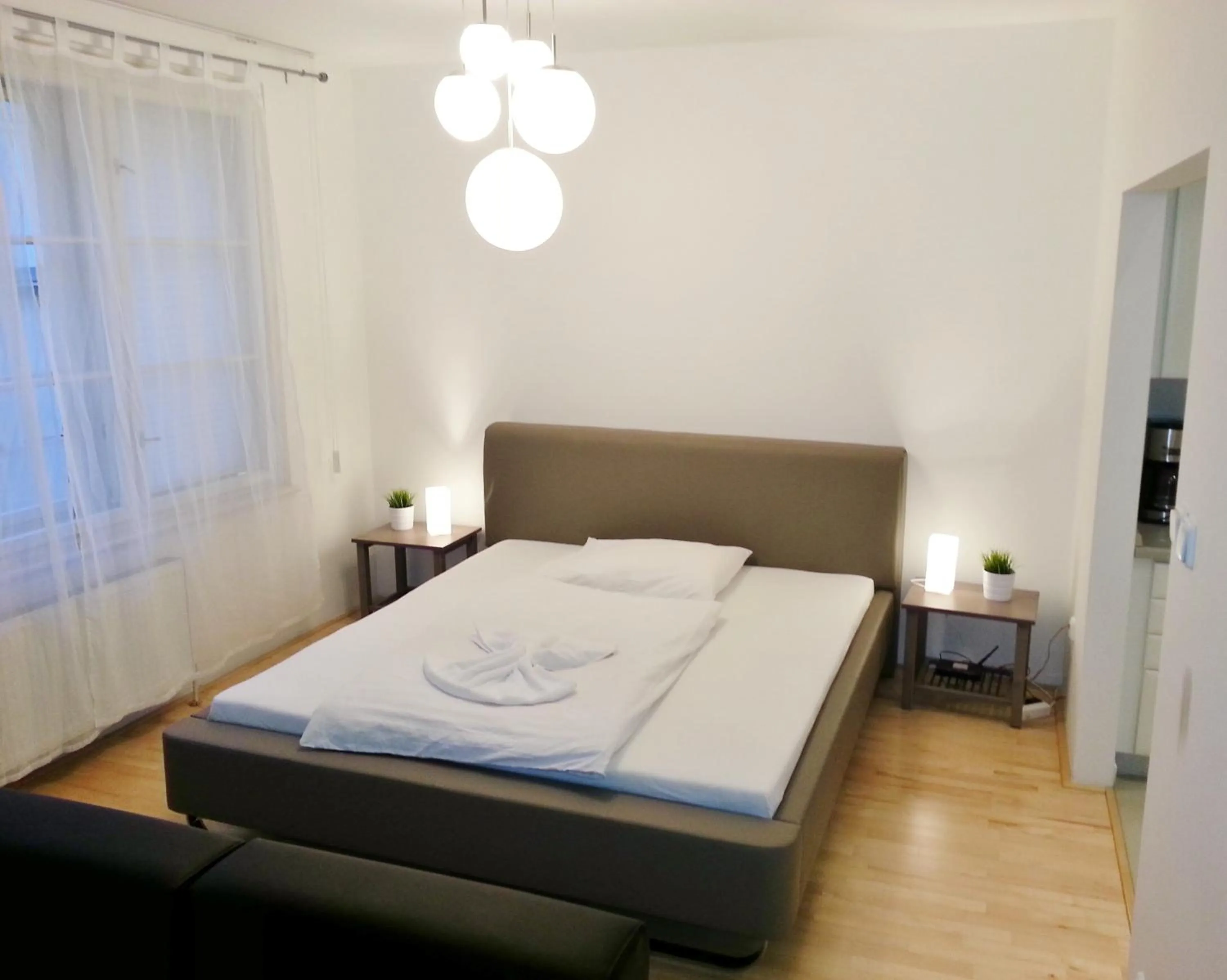 Bed in Old Town Square Apartments