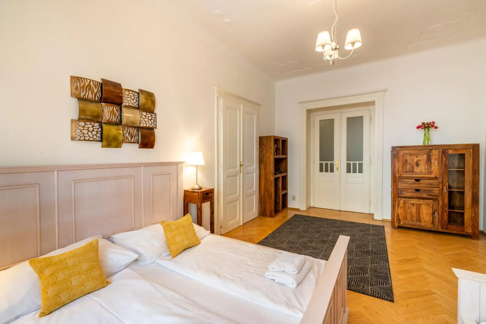 Bed in Old Town Square Apartments