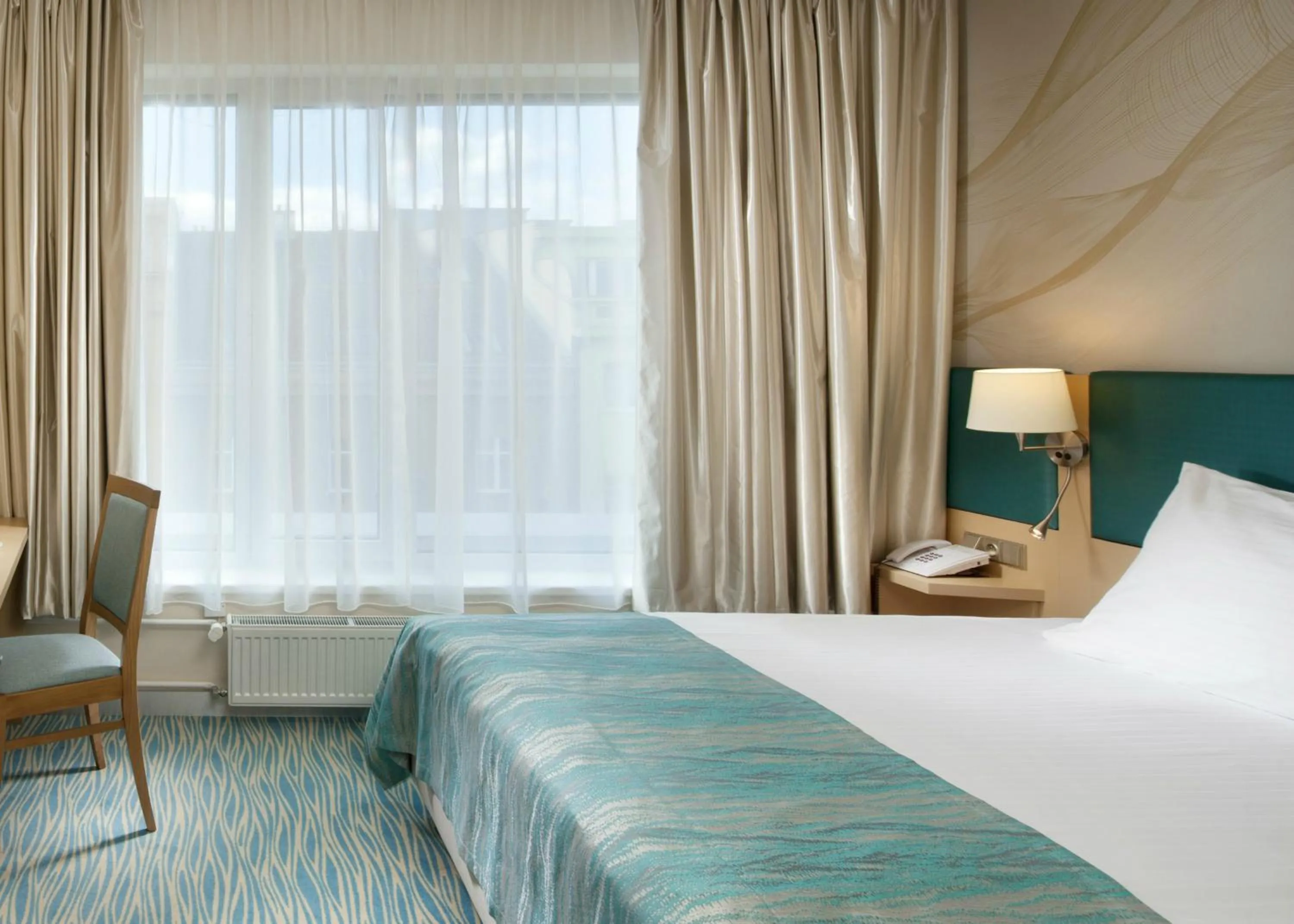 Photo of the whole room, Bed in Holiday Inn Prague by IHG