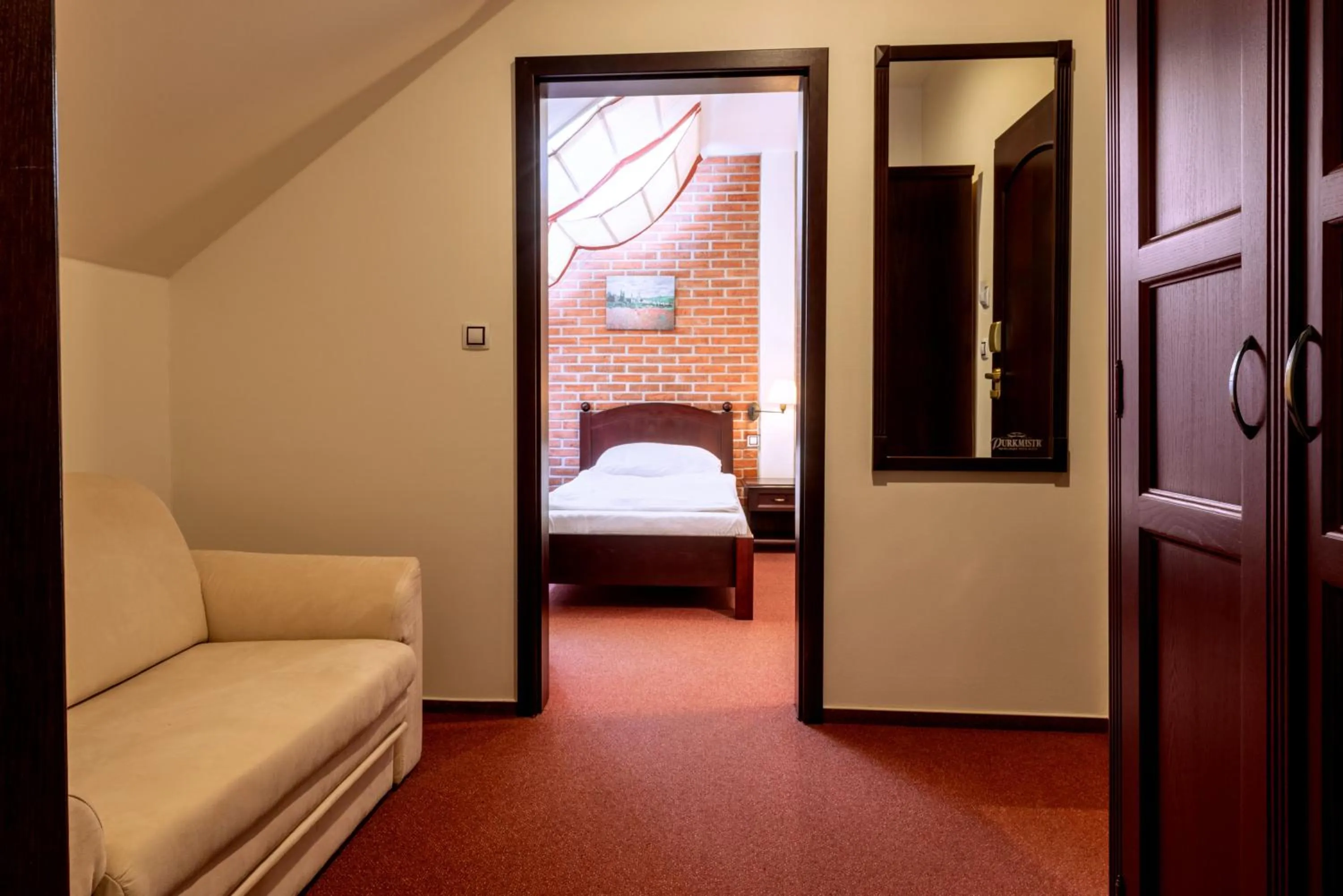 Living room, Bed in Hotel Purkmistr