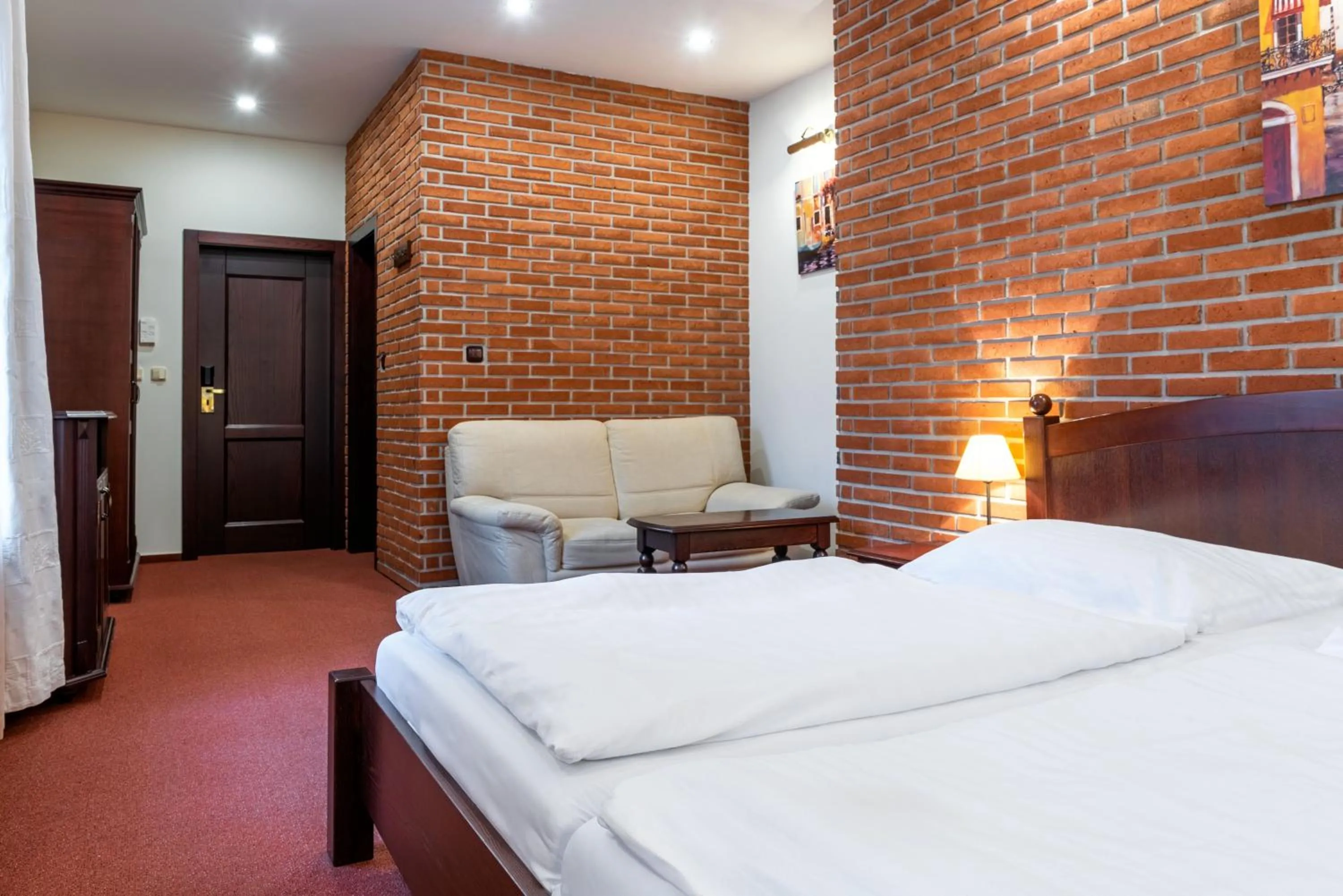 Living room, Bed in Wellness Hotel Gondola