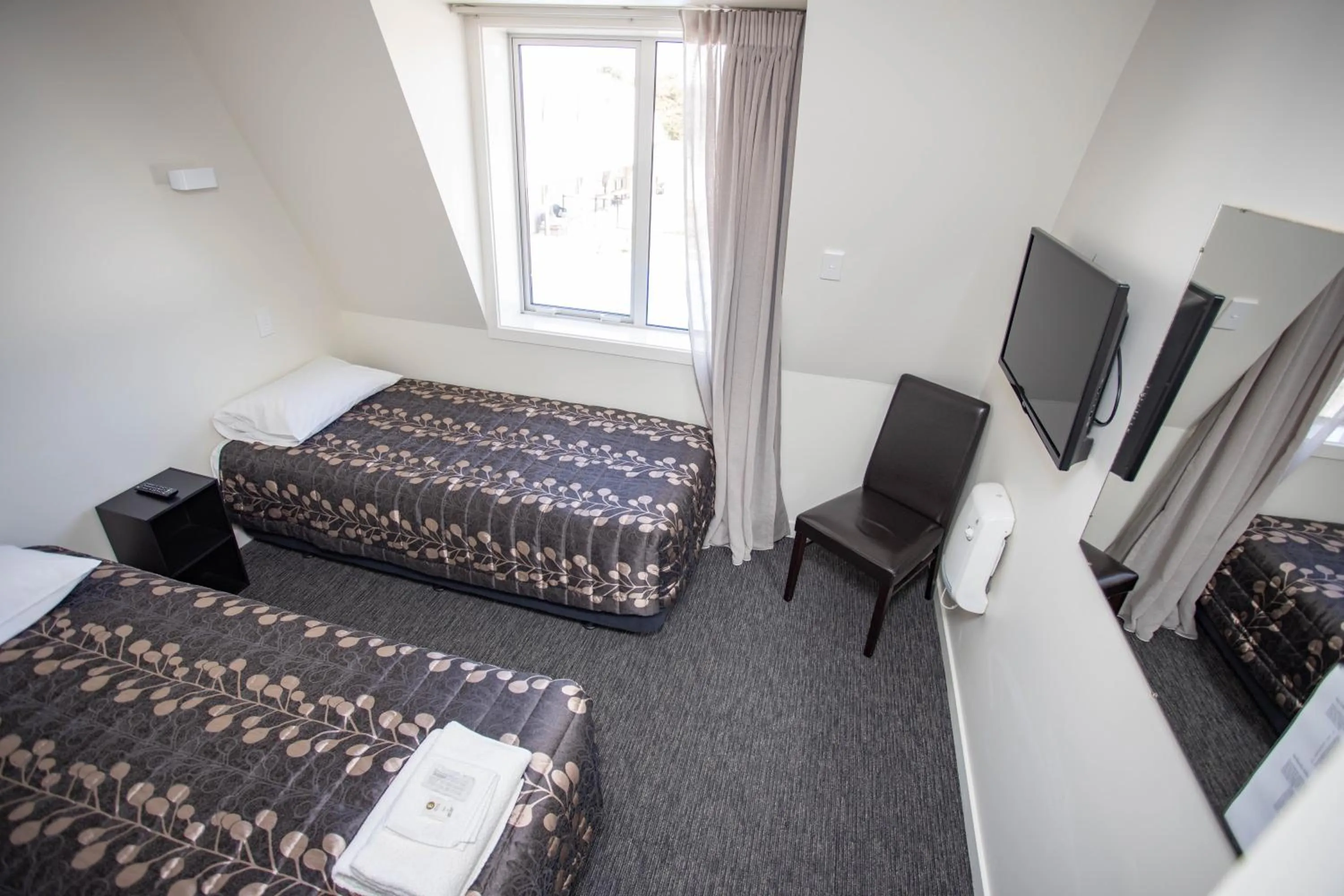 Bed in Southern Cross Lodge Methven