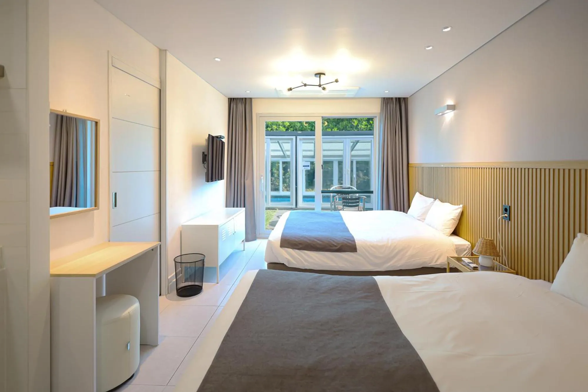 Seating area, Bed in Pool and Villa Sorang