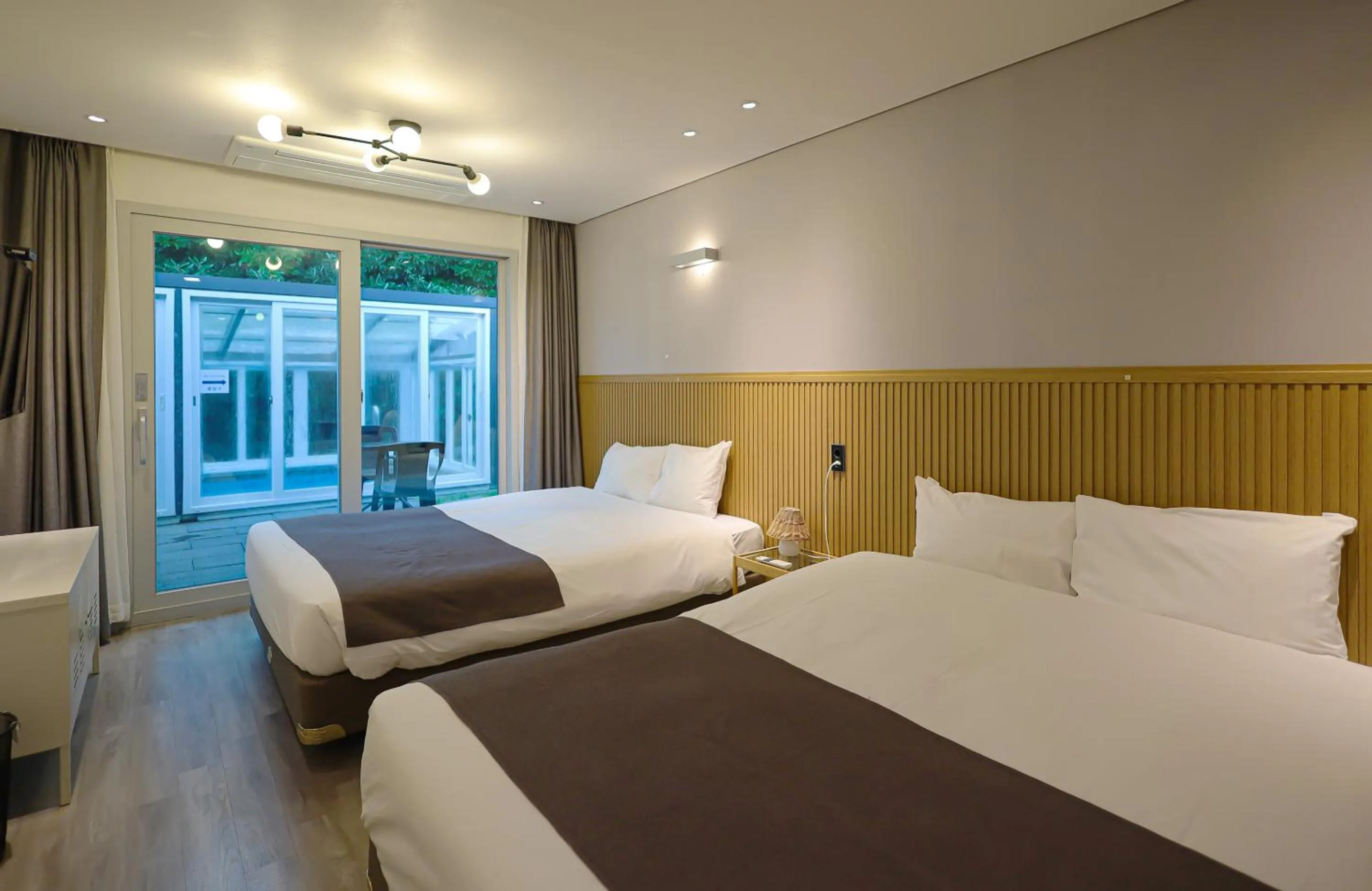 Bed in Pool and Villa Sorang