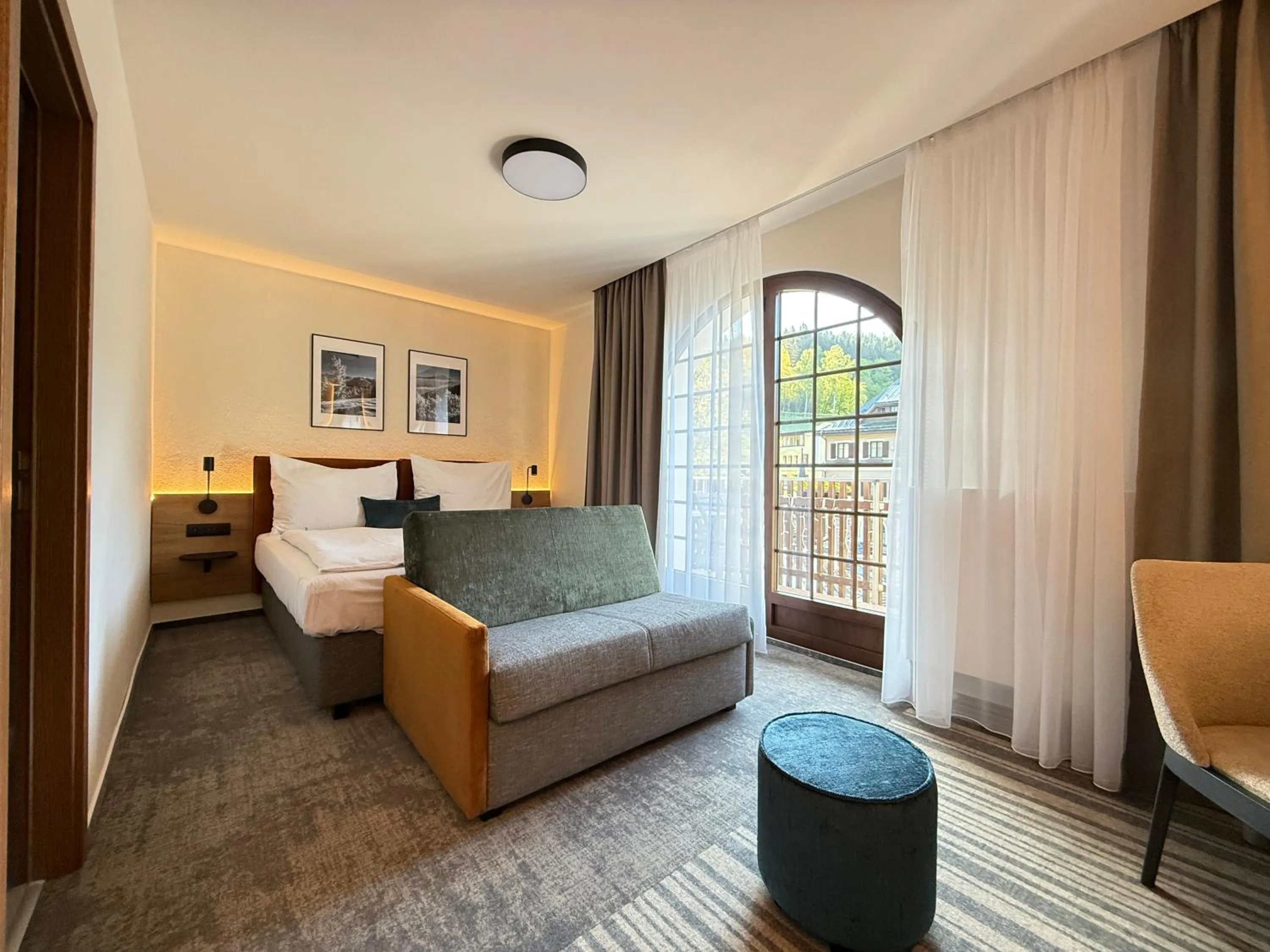 Living room, Bed in Wellness Hotel Windsor