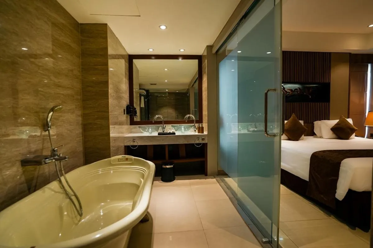Bathroom, Bed in The Nest Hotel Nusa Dua