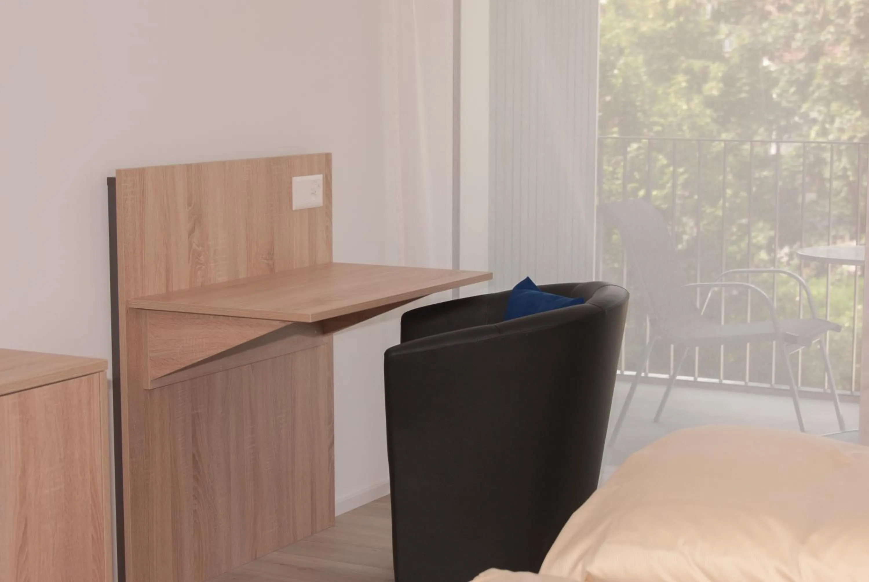 Seating area, Bed in Hotel Traube Garni