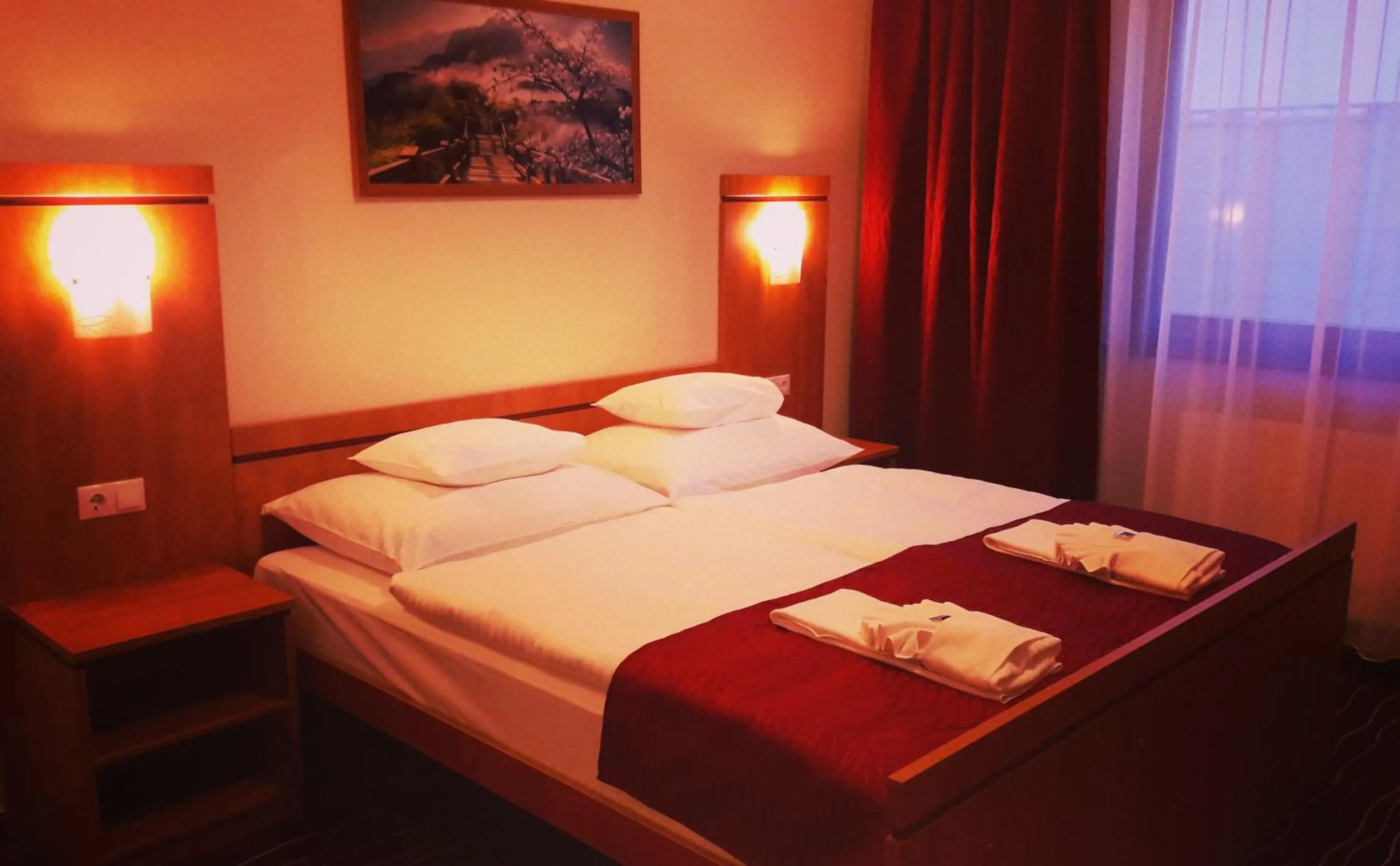 Bed in Diana Club Hotel