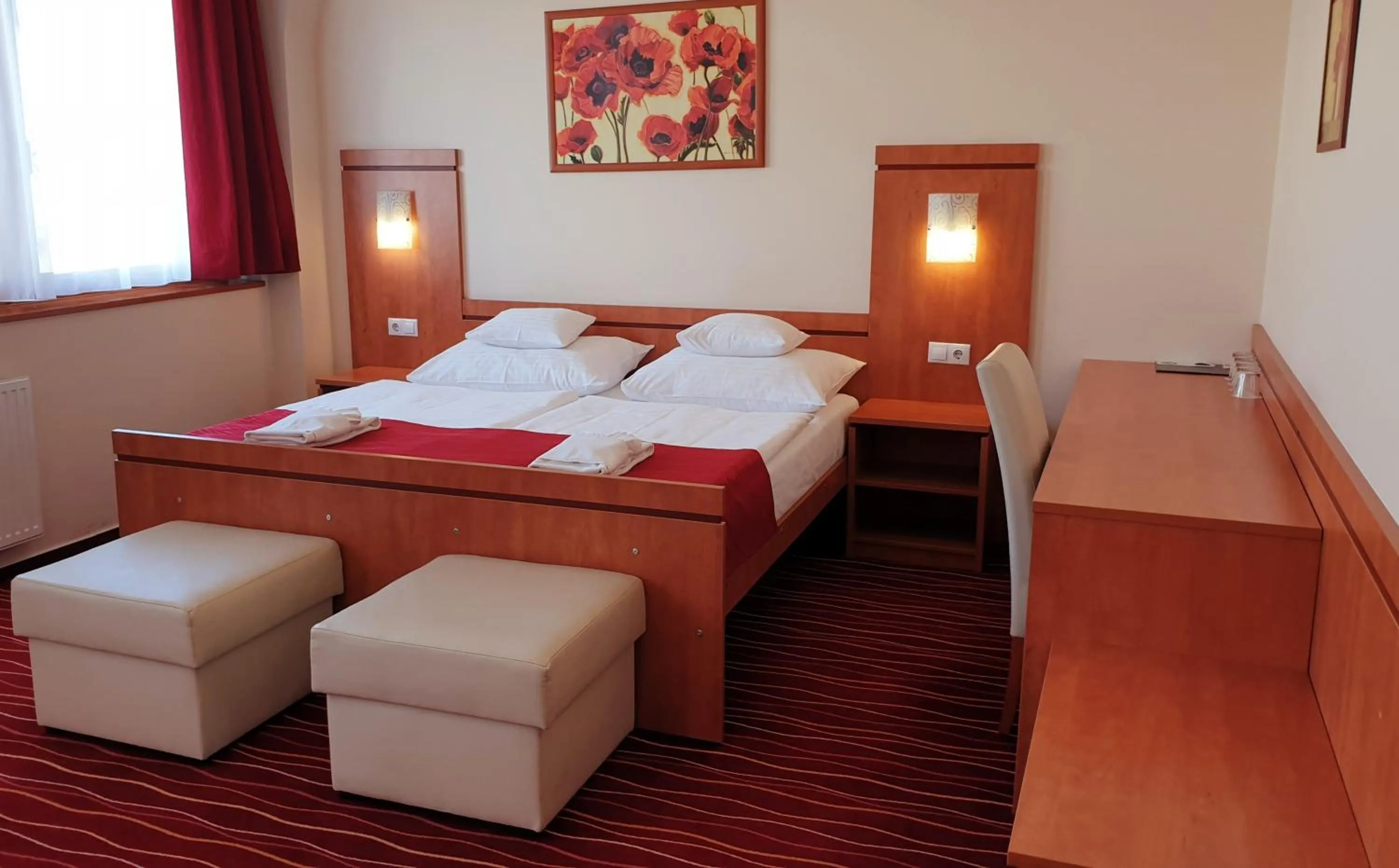 Bed in Diana Club Hotel