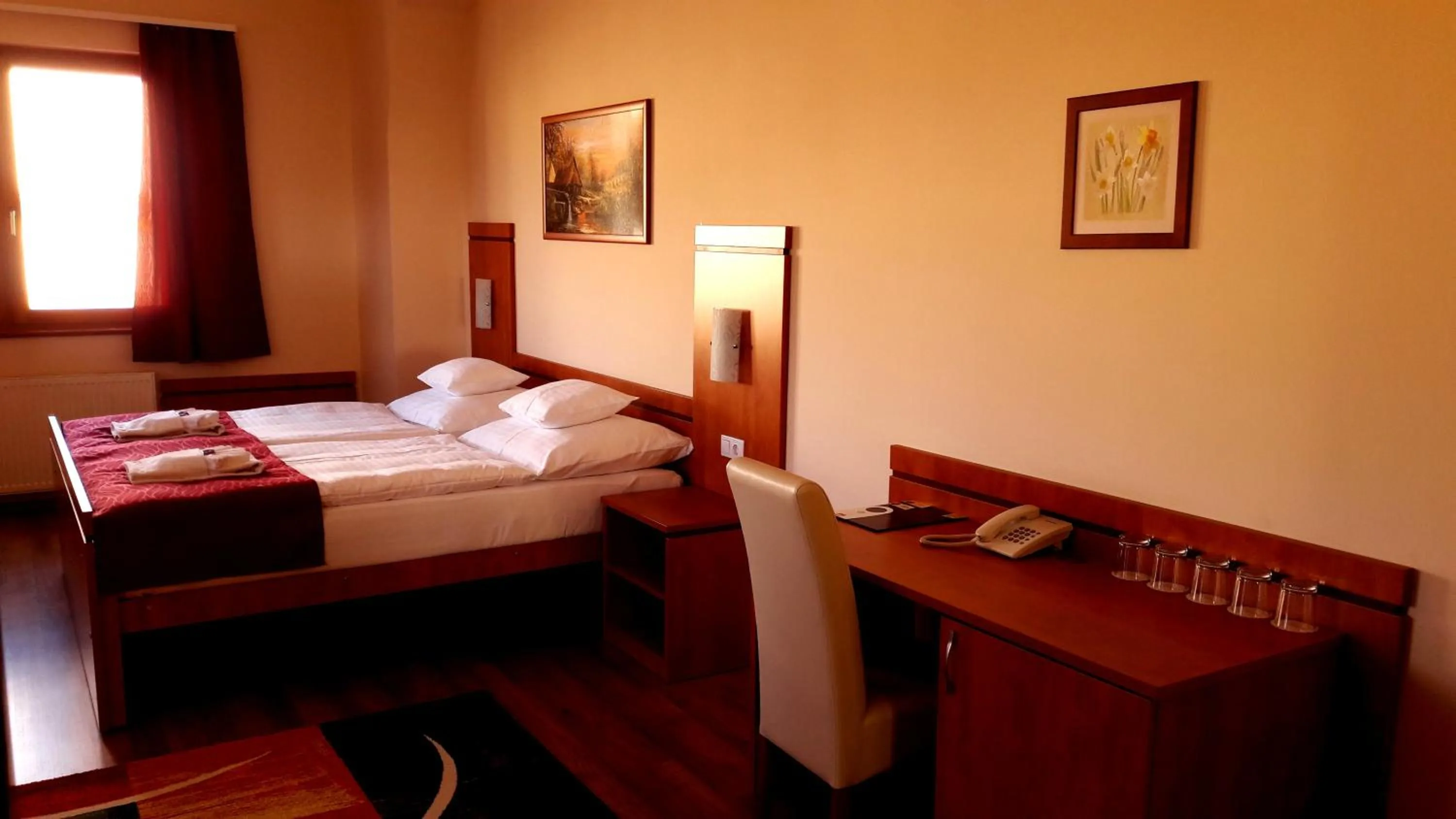 Bed in Diana Club Hotel