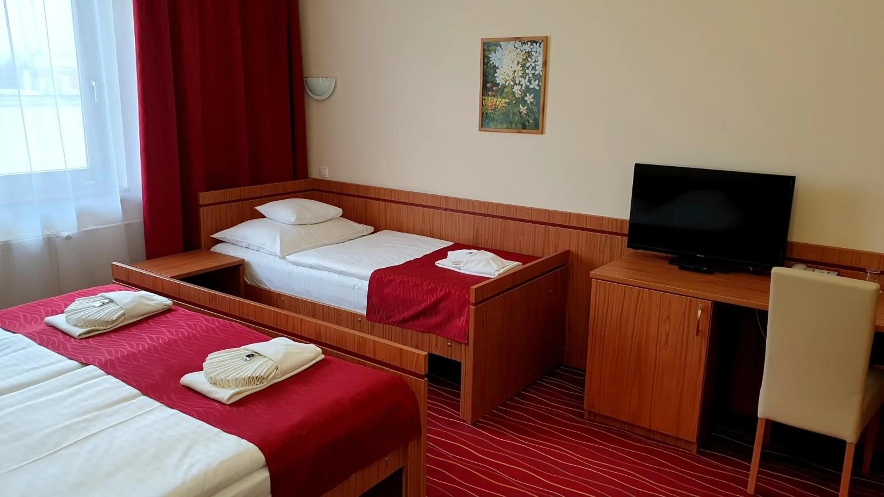 Bed in Diana Club Hotel