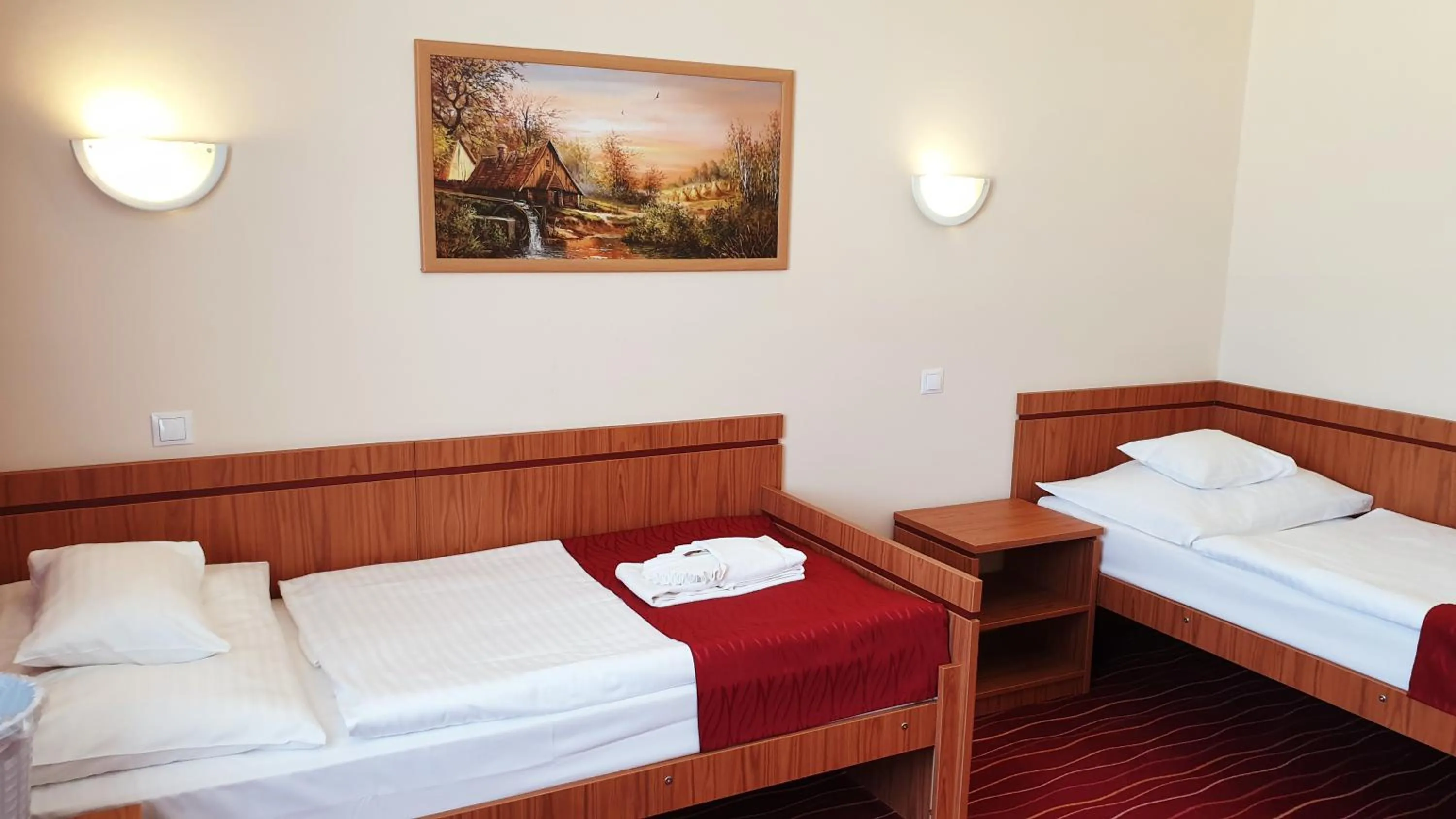 Bed in Diana Club Hotel