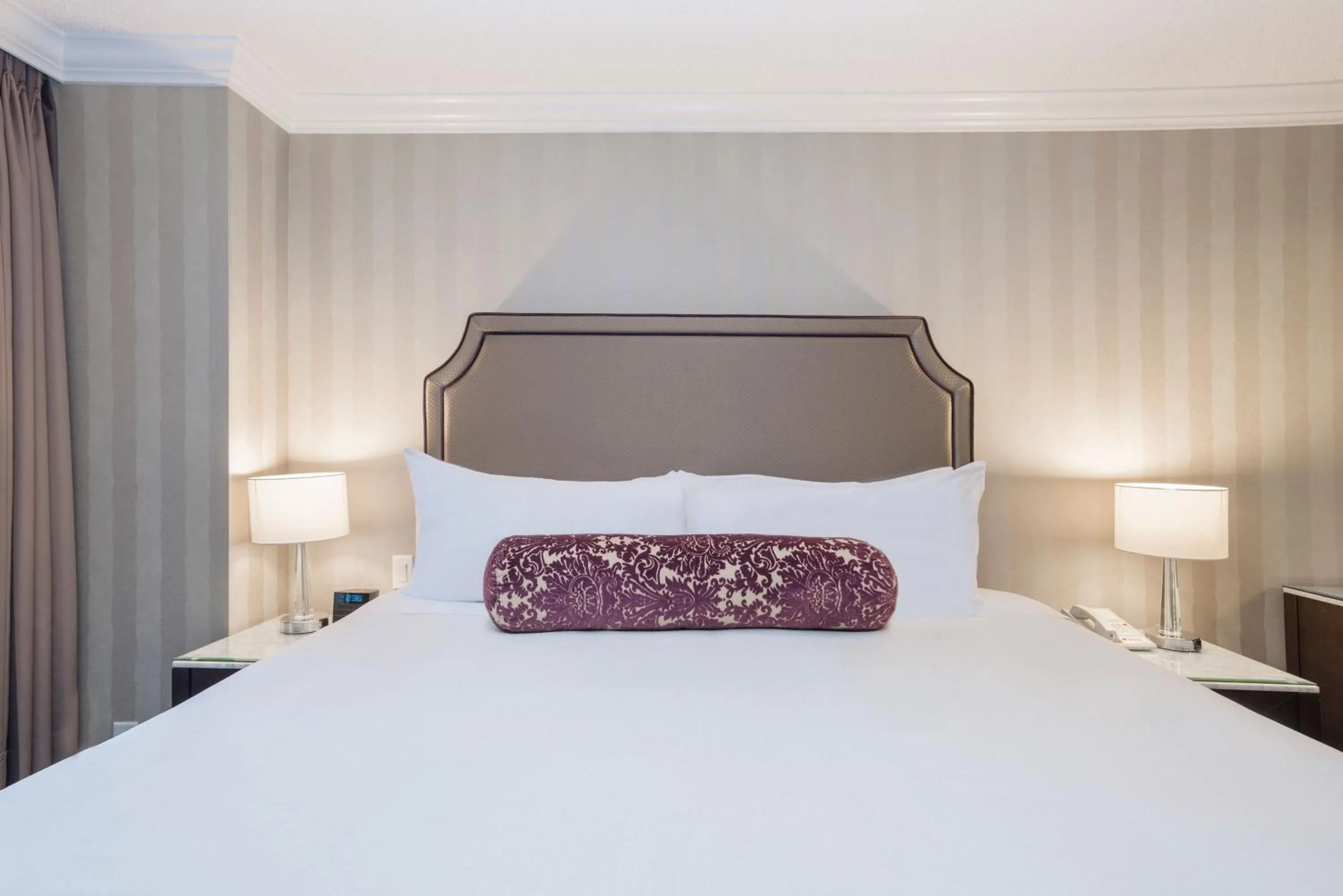 Photo of the whole room, Bed in La Grande Residence at the Sutton Place Hotel