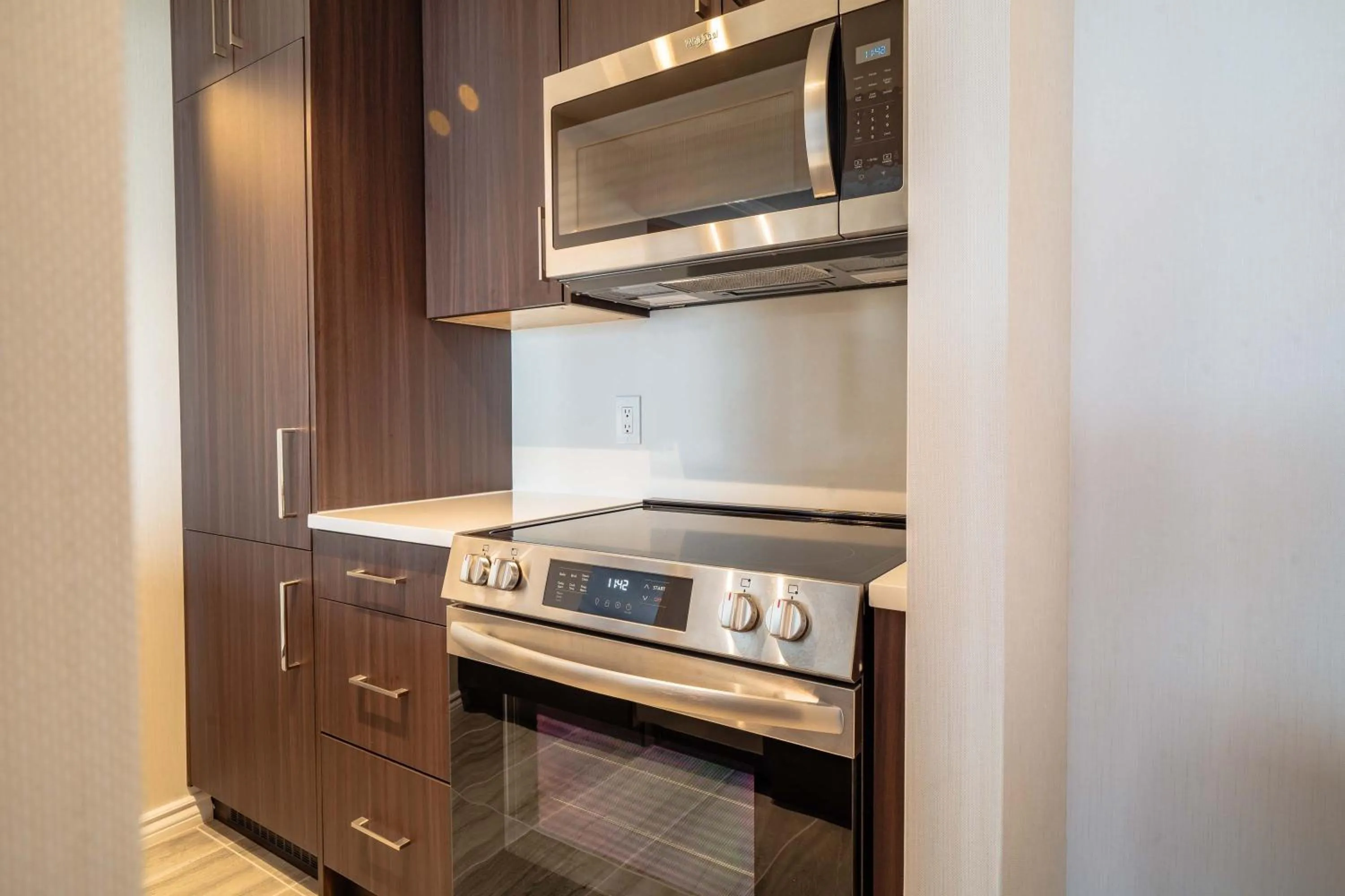 Kitchen or kitchenette in La Grande Residence at the Sutton Place Hotel
