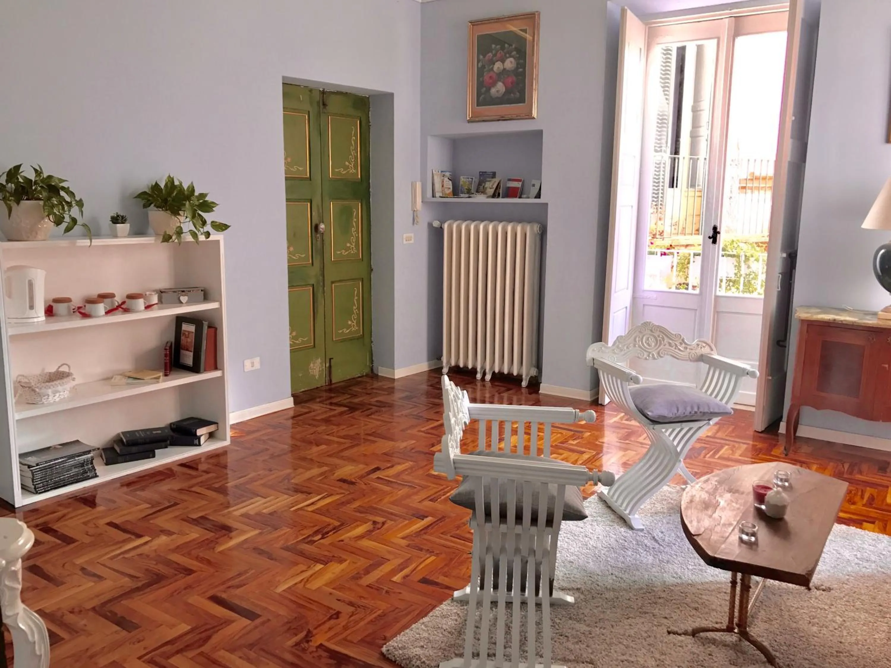 Communal lounge/ TV room in B&B Palazzo Giorgi