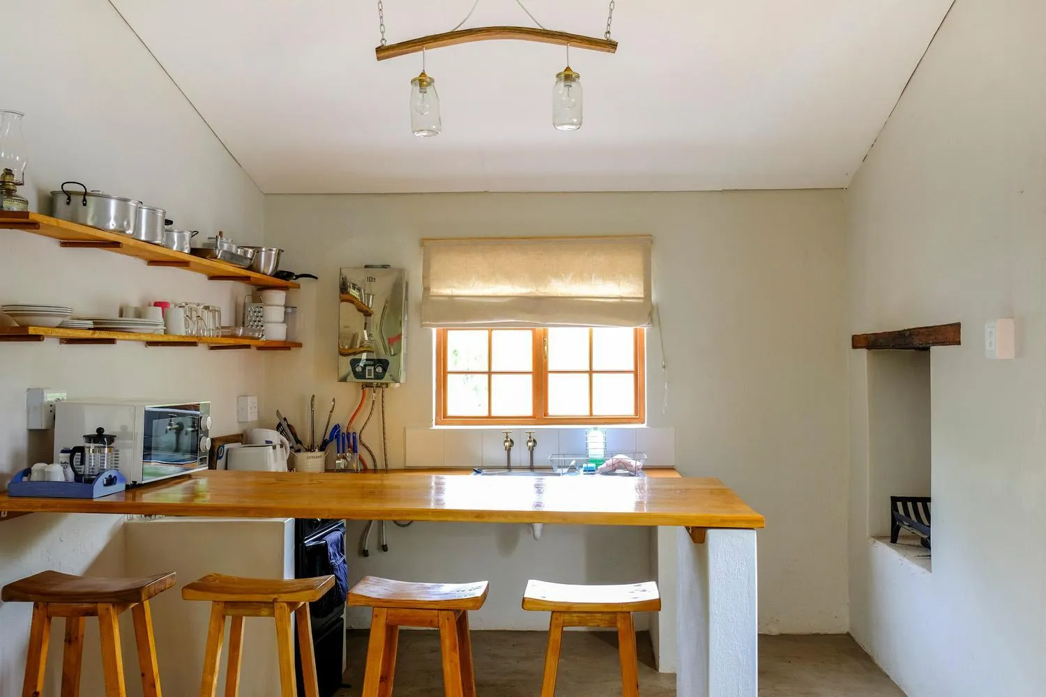 Kitchen or kitchenette in De Bos Cottages