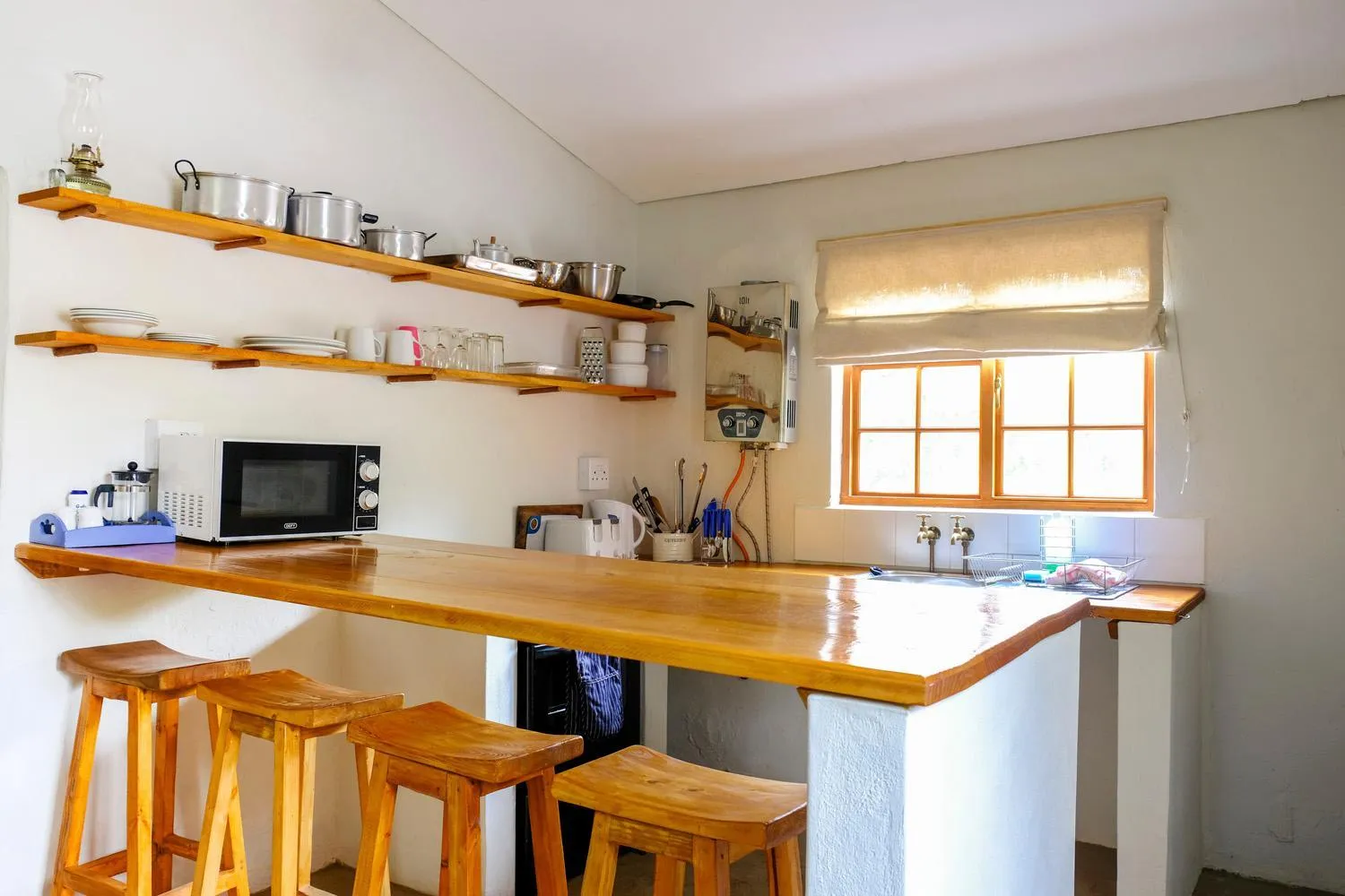 Kitchen or kitchenette in De Bos Cottages