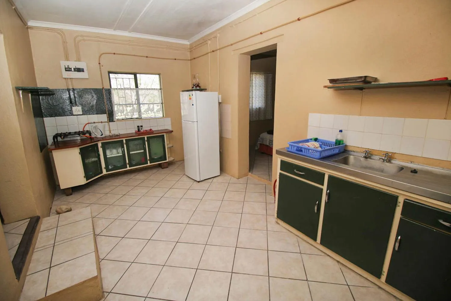 Kitchen or kitchenette in De Bos Cottages