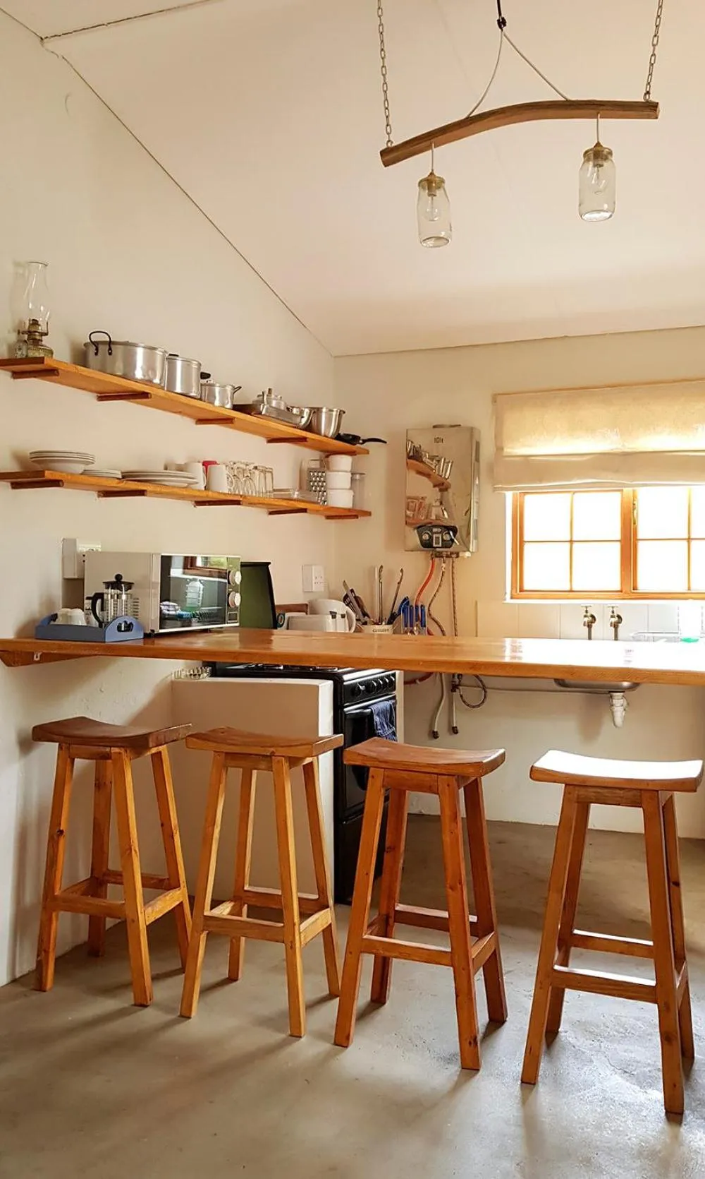 Kitchen or kitchenette in De Bos Cottages