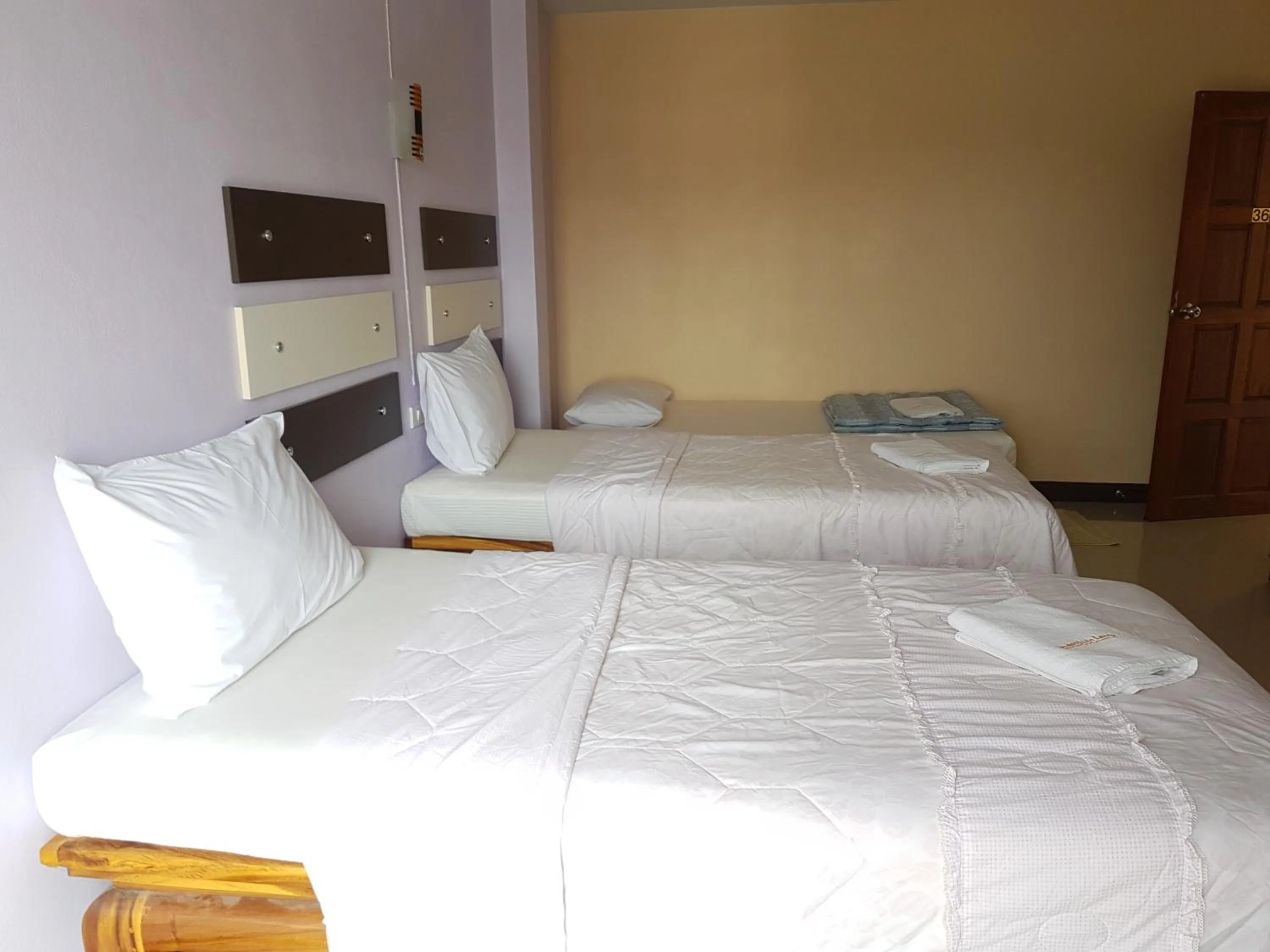 Bed in The Star Villa Resort