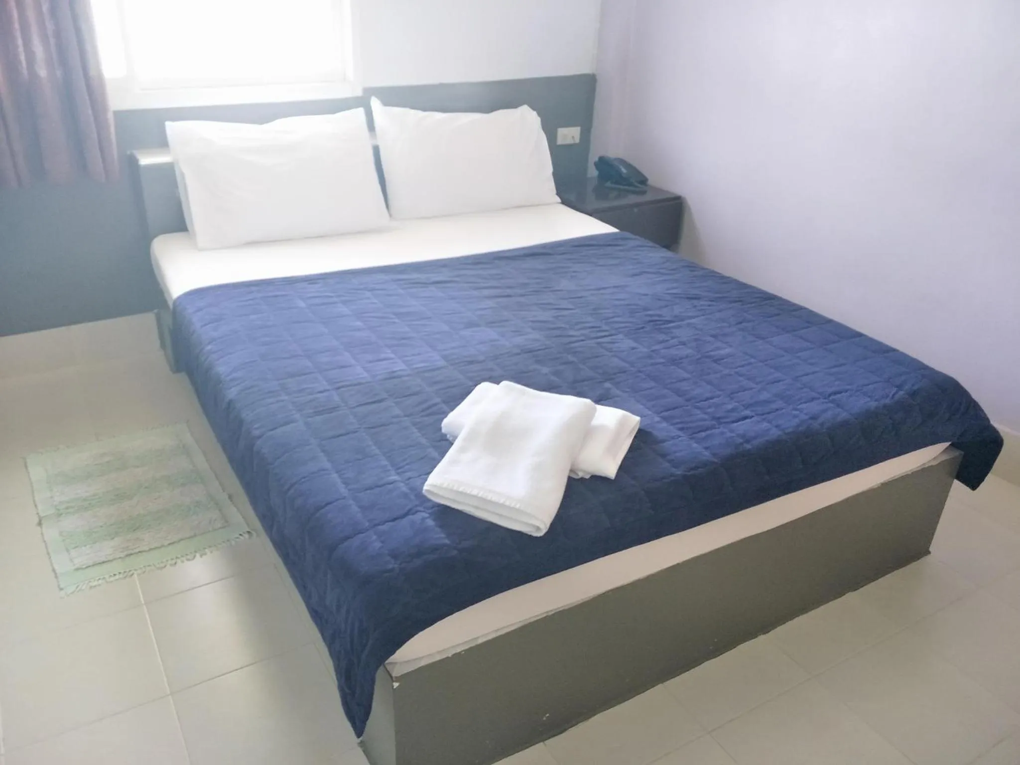 Bed in The Star Villa Resort